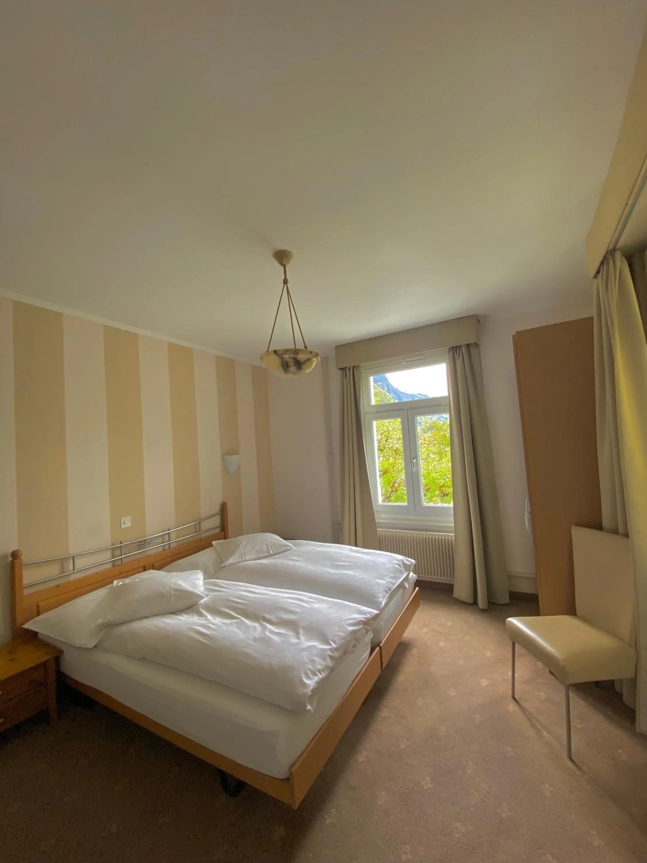 Bed in Hotel De La Paix