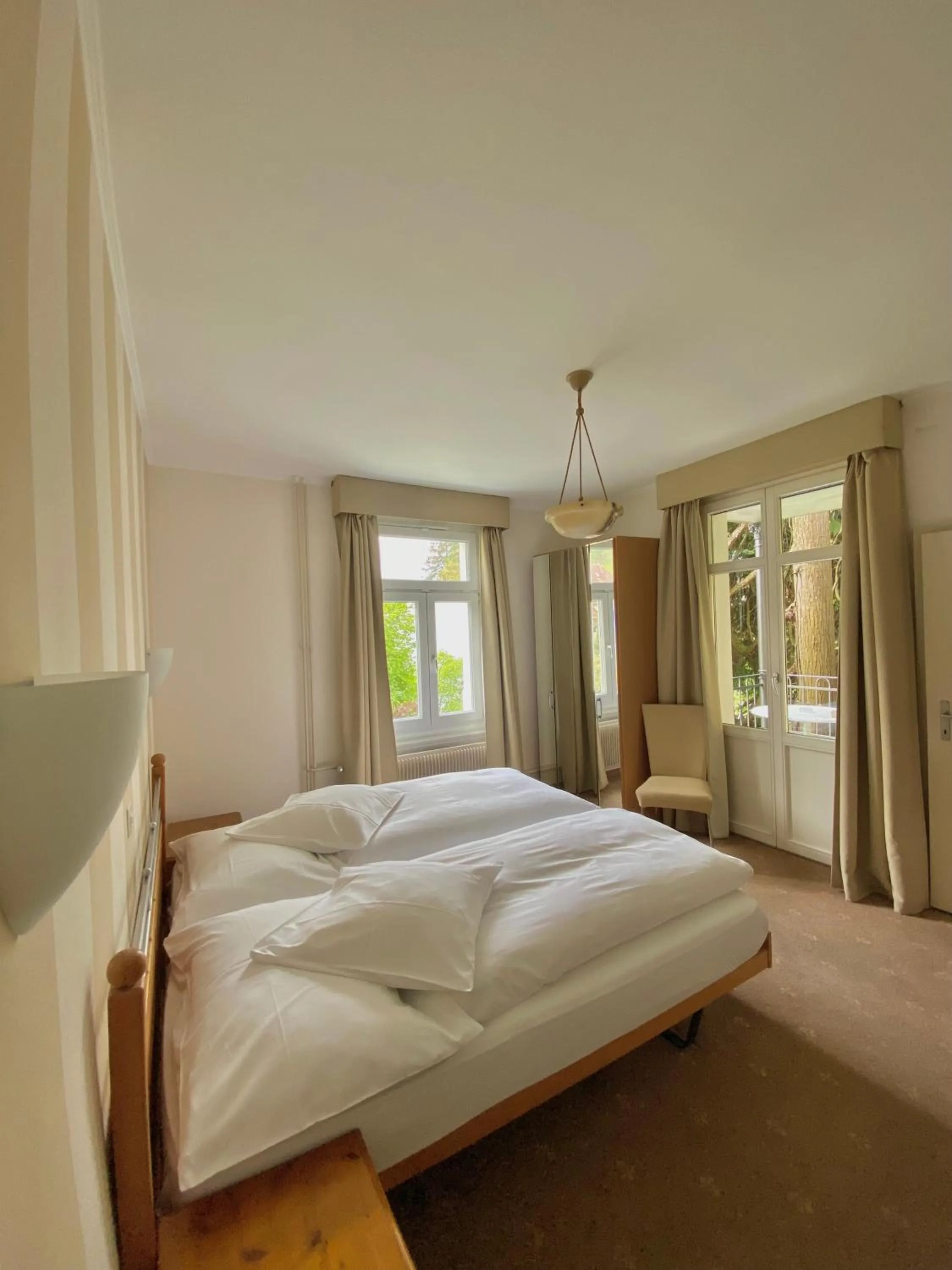 Bed in Hotel De La Paix