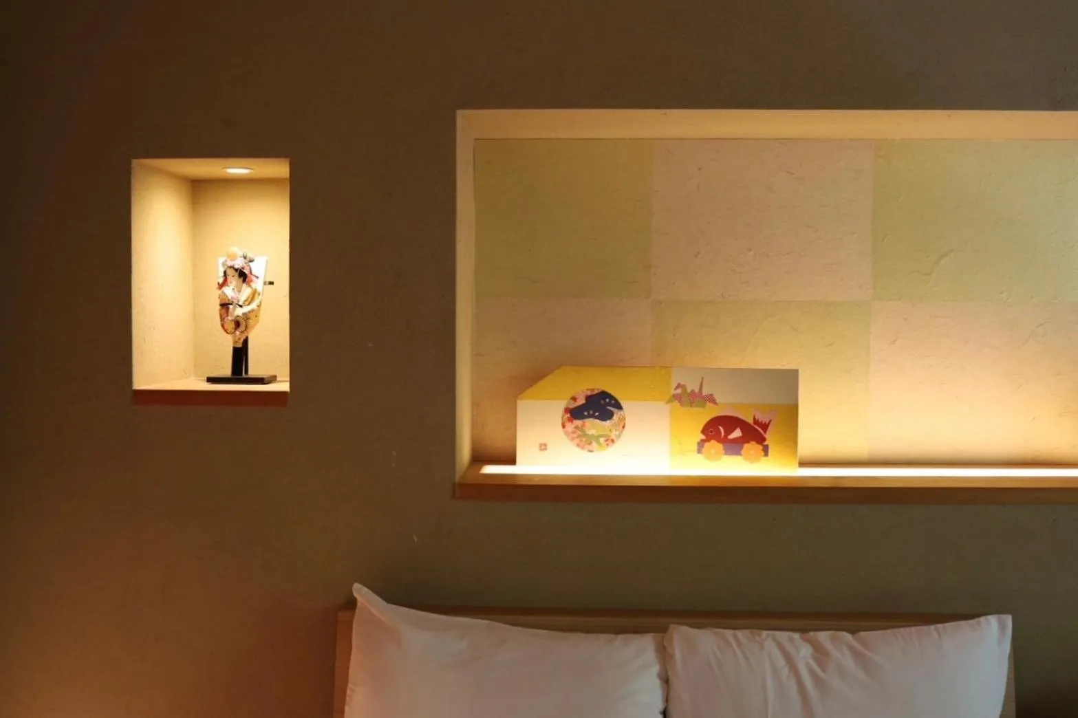 Bed in Hotel Rakurakuan