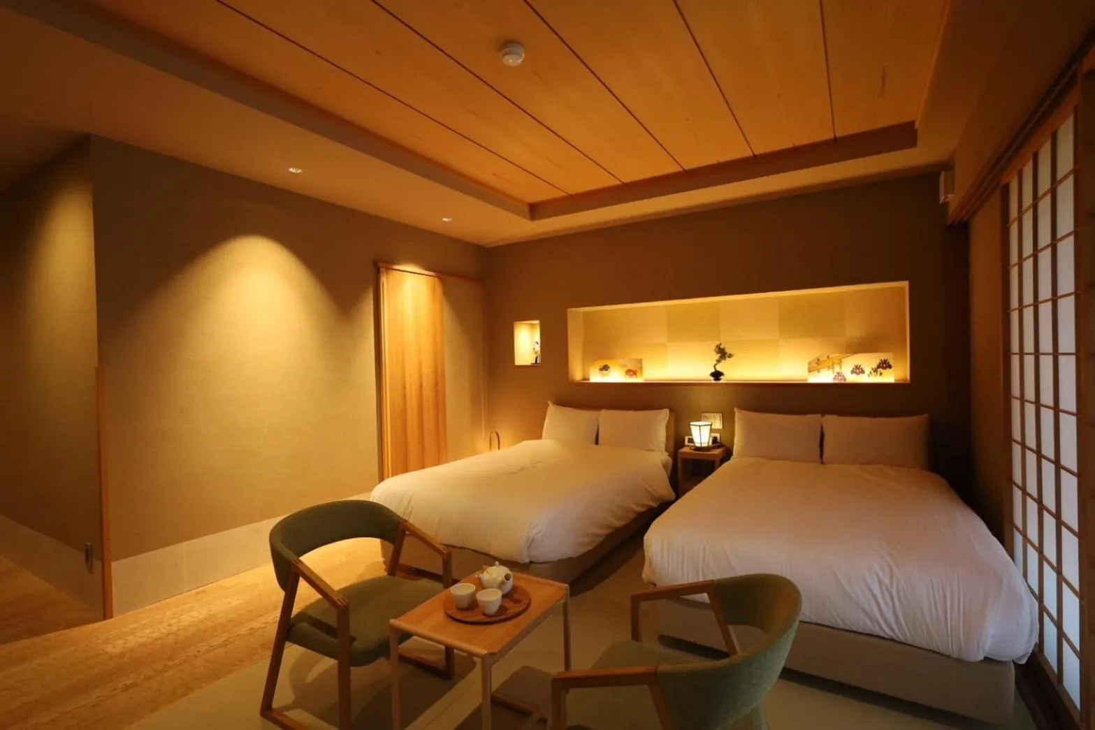 Bed in Hotel Rakurakuan