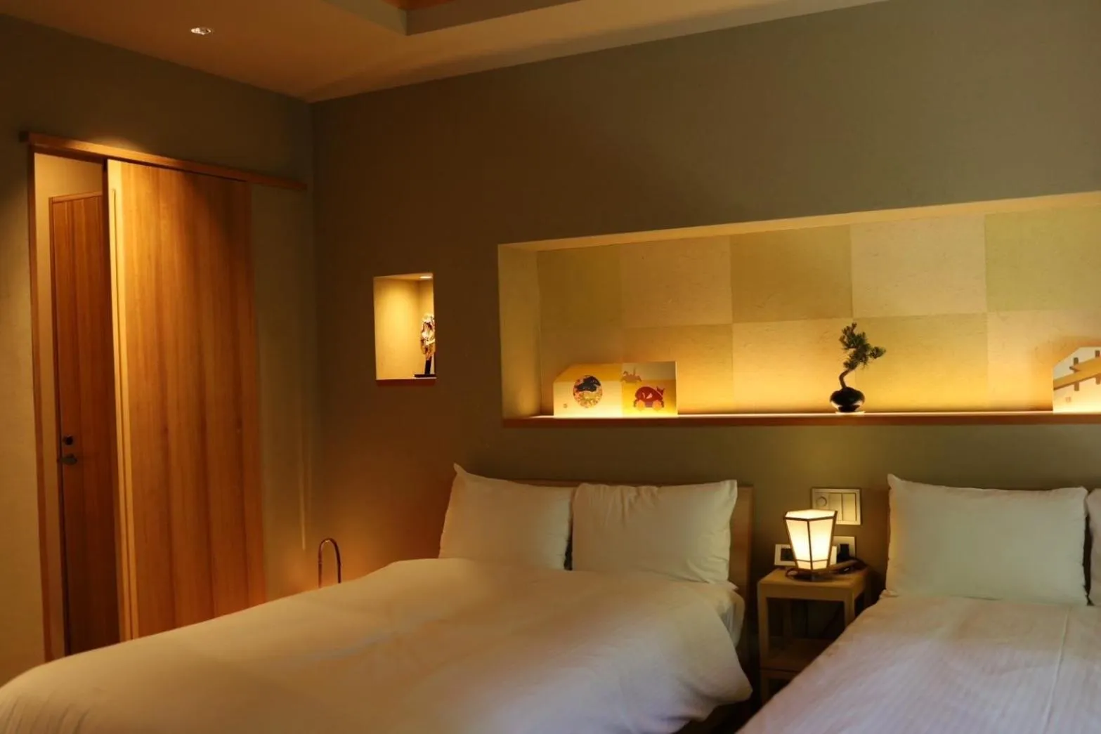 Bed in Hotel Rakurakuan