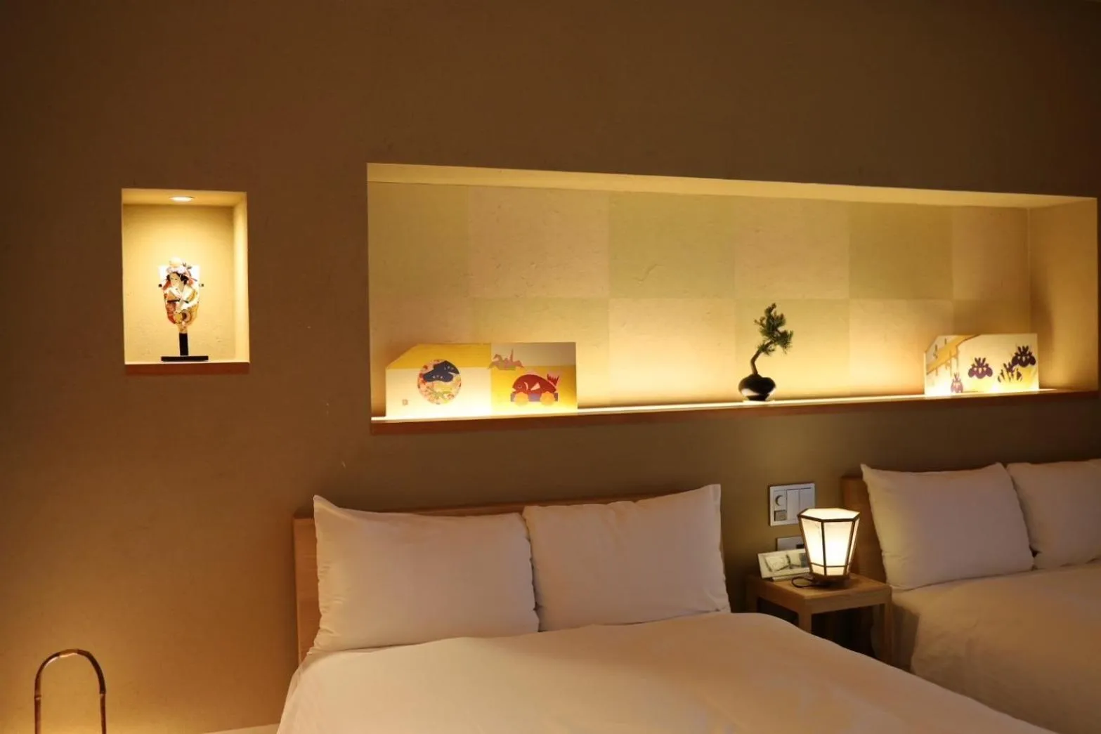 Bed in Hotel Rakurakuan