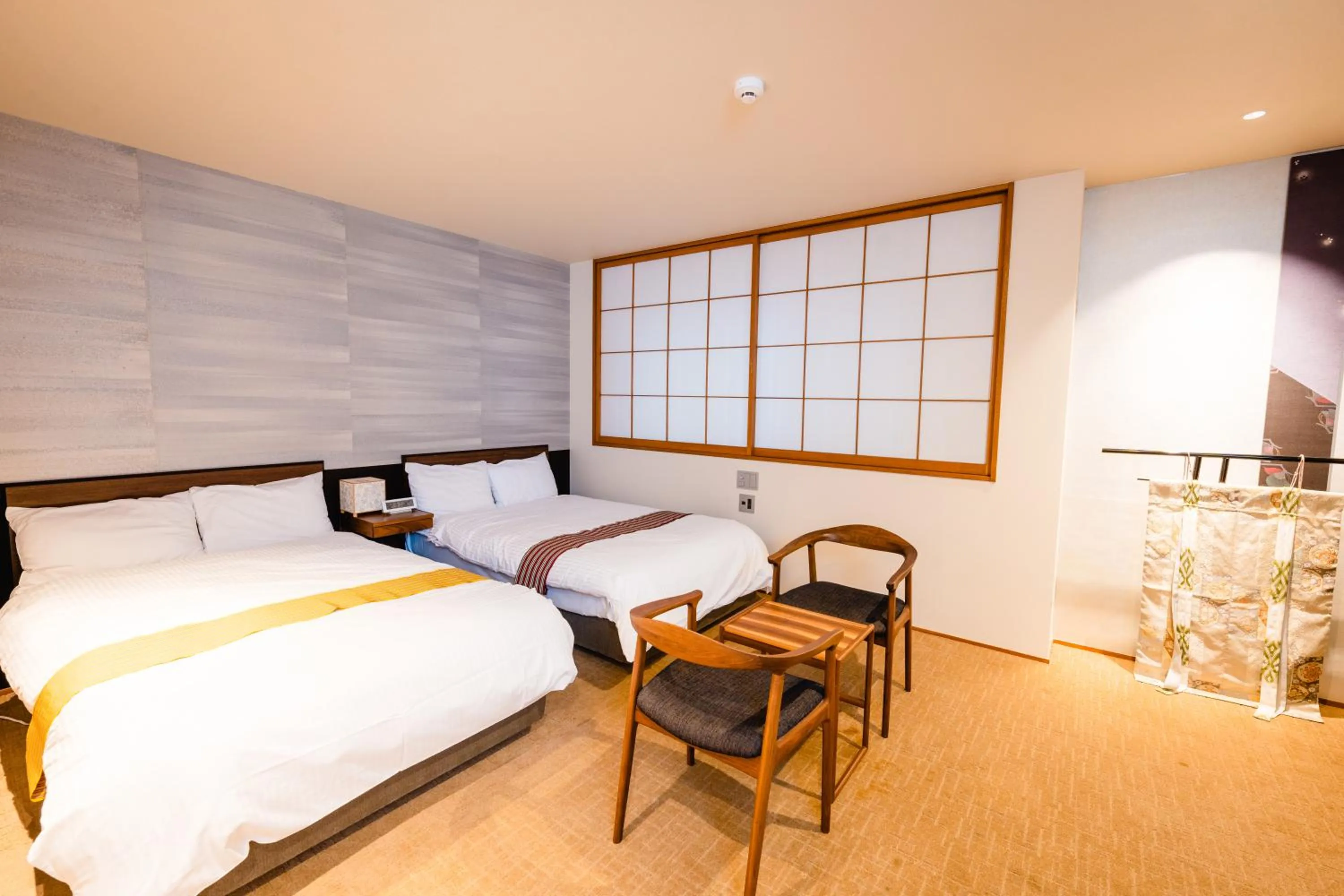 Bed in Hotel Rakurakuan