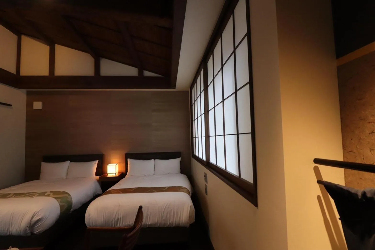 Bed in Hotel Rakurakuan