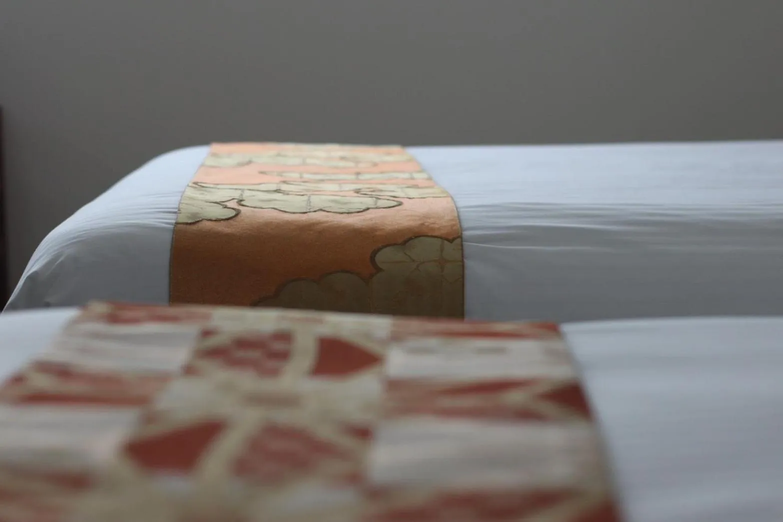 Bed in Hotel Rakurakuan