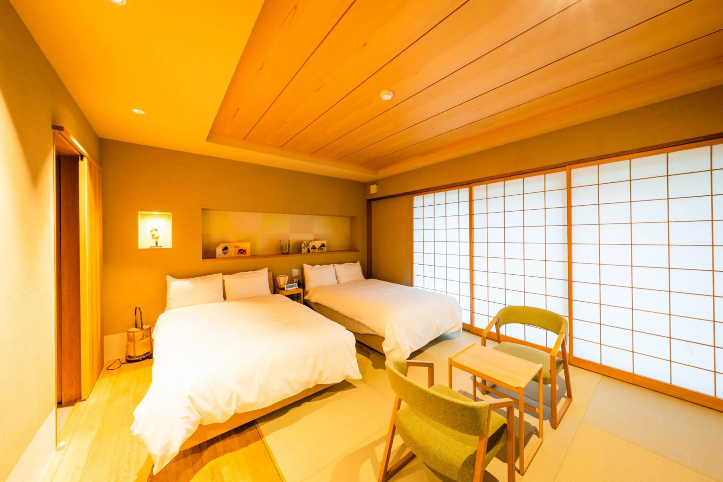 Bed in Hotel Rakurakuan