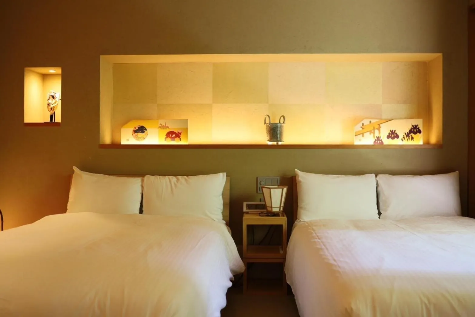 Bed in Hotel Rakurakuan