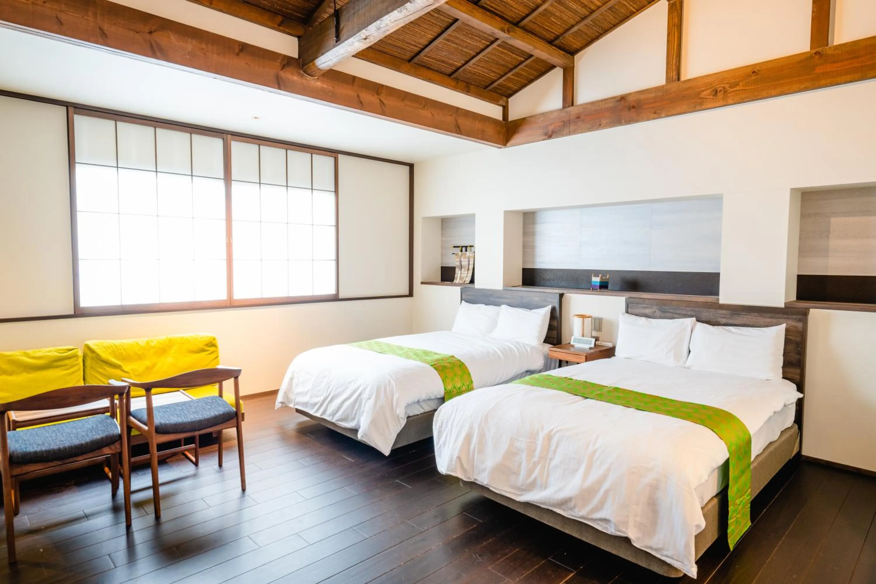 Bed in Hotel Rakurakuan