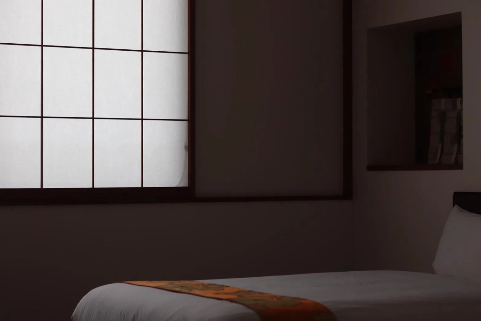 Bed in Hotel Rakurakuan