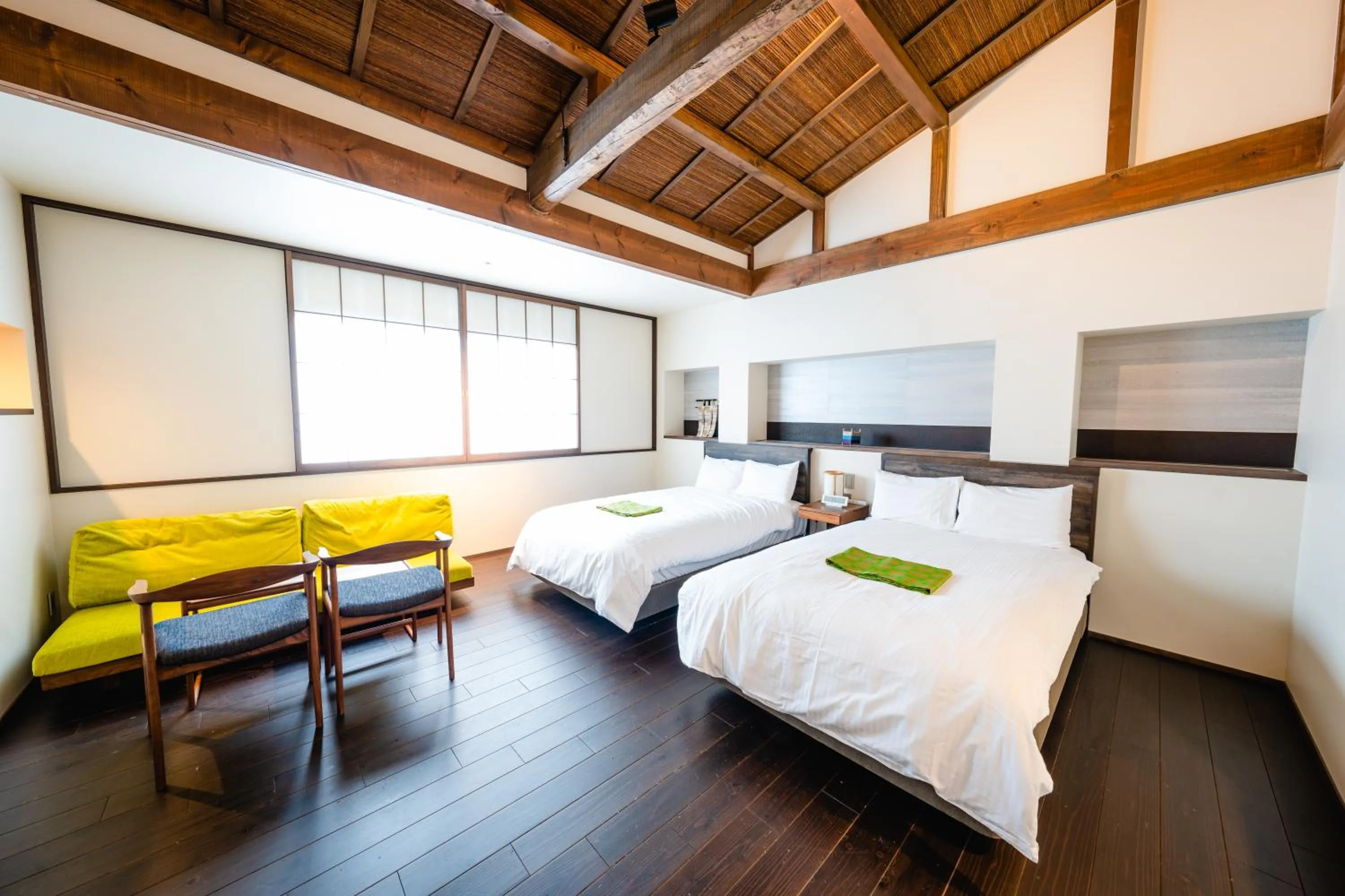 Bed in Hotel Rakurakuan