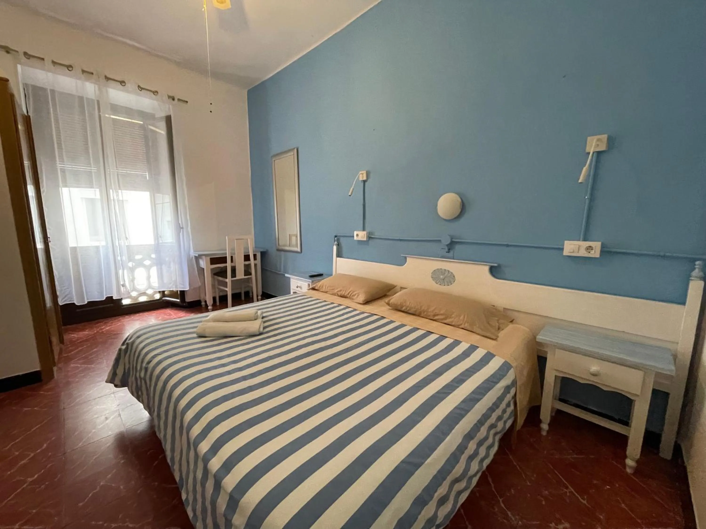 Bed in P&R hostals Can Tort