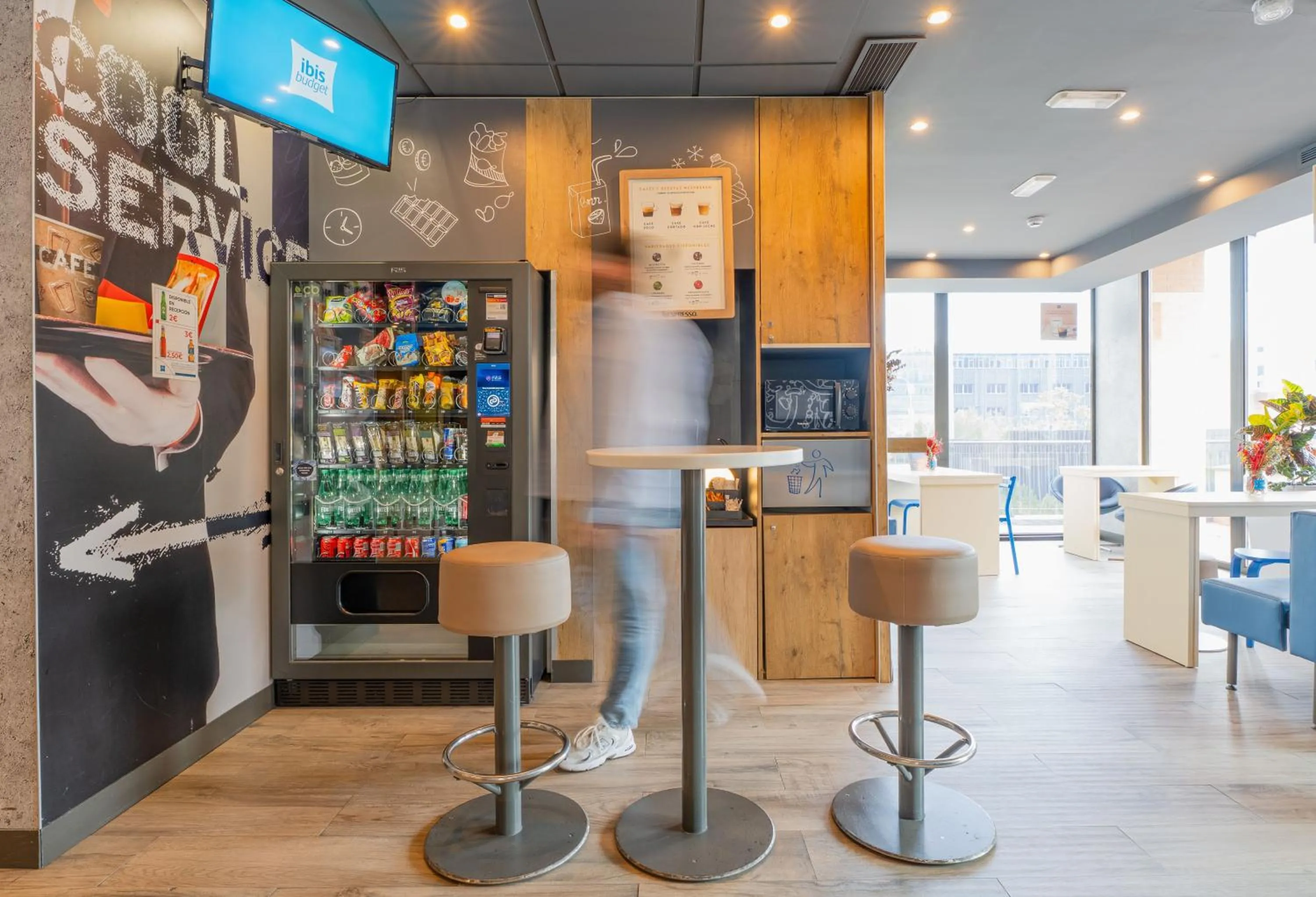 Communal lounge/ TV room in Ibis Budget Madrid Calle Alcalá