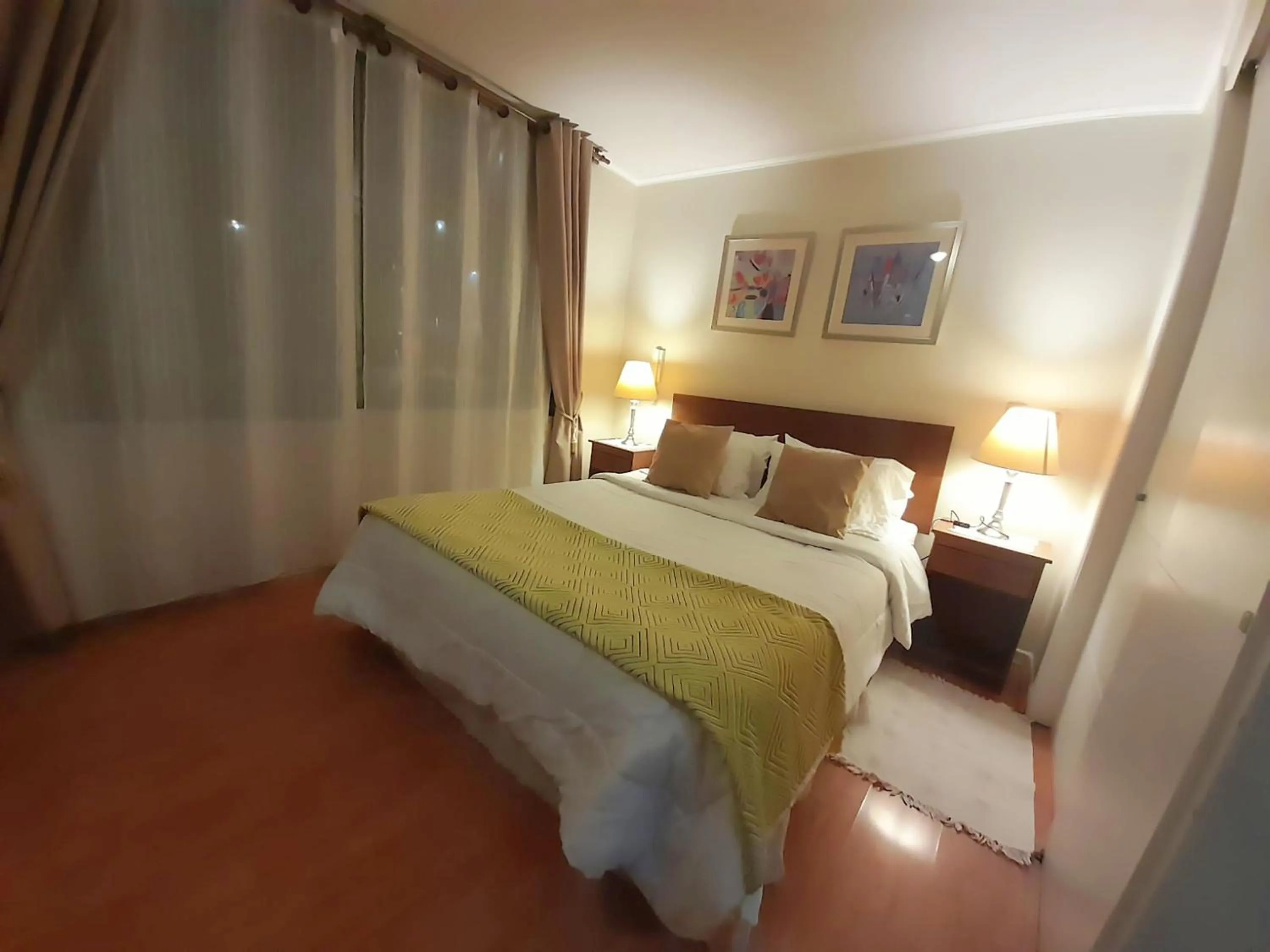 Photo of the whole room, Bed in VIP Apartments Chile