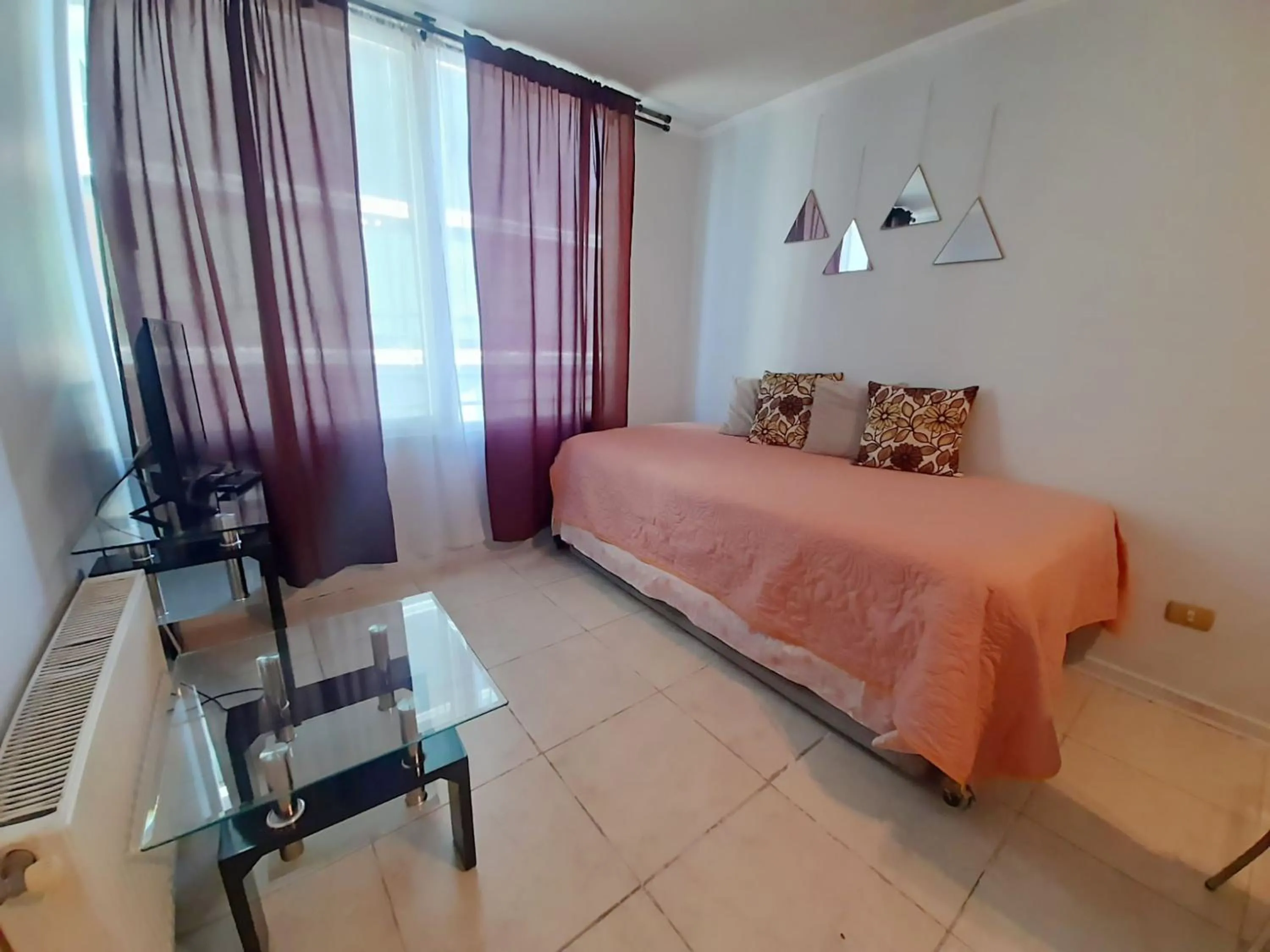 Decorative detail, Bed in VIP Apartments Chile