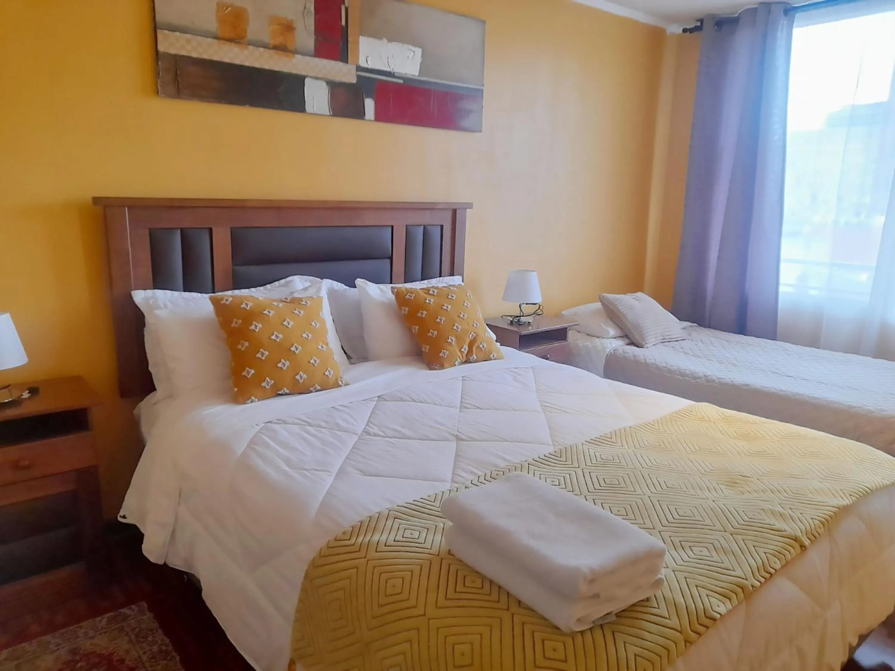 Decorative detail, Bed in VIP Apartments Chile