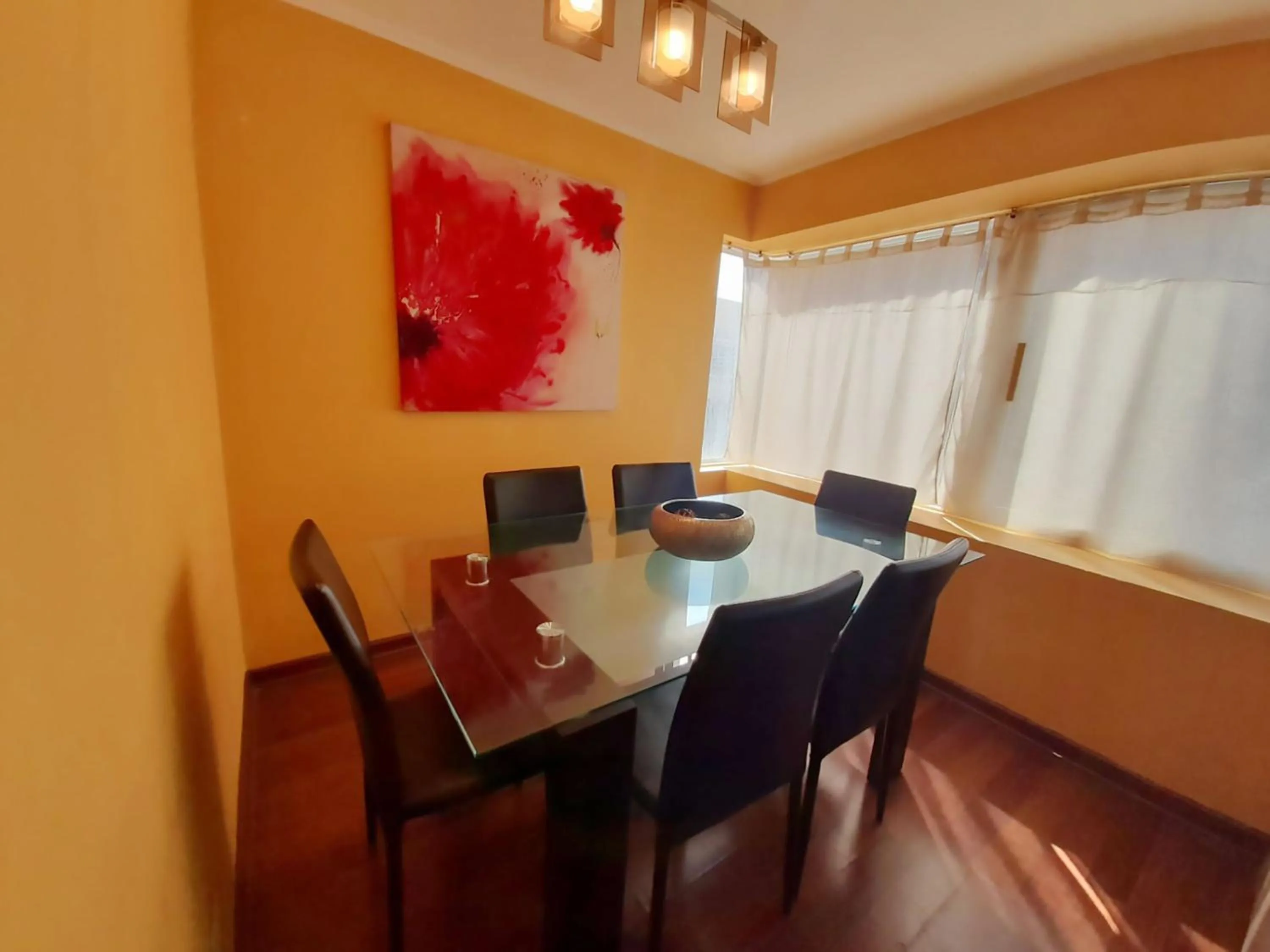 Dining area in VIP Apartments Chile