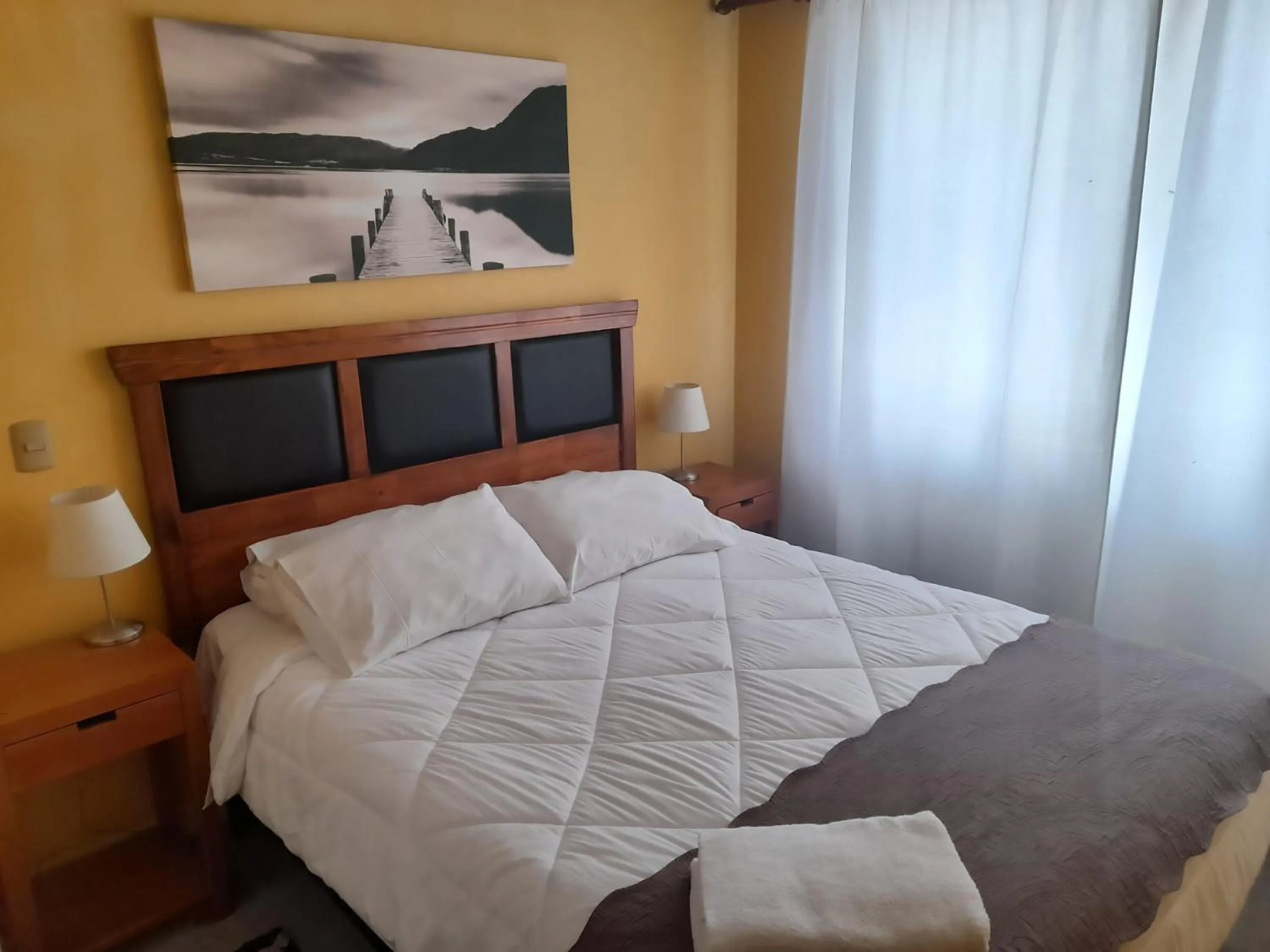 Decorative detail, Bed in VIP Apartments Chile