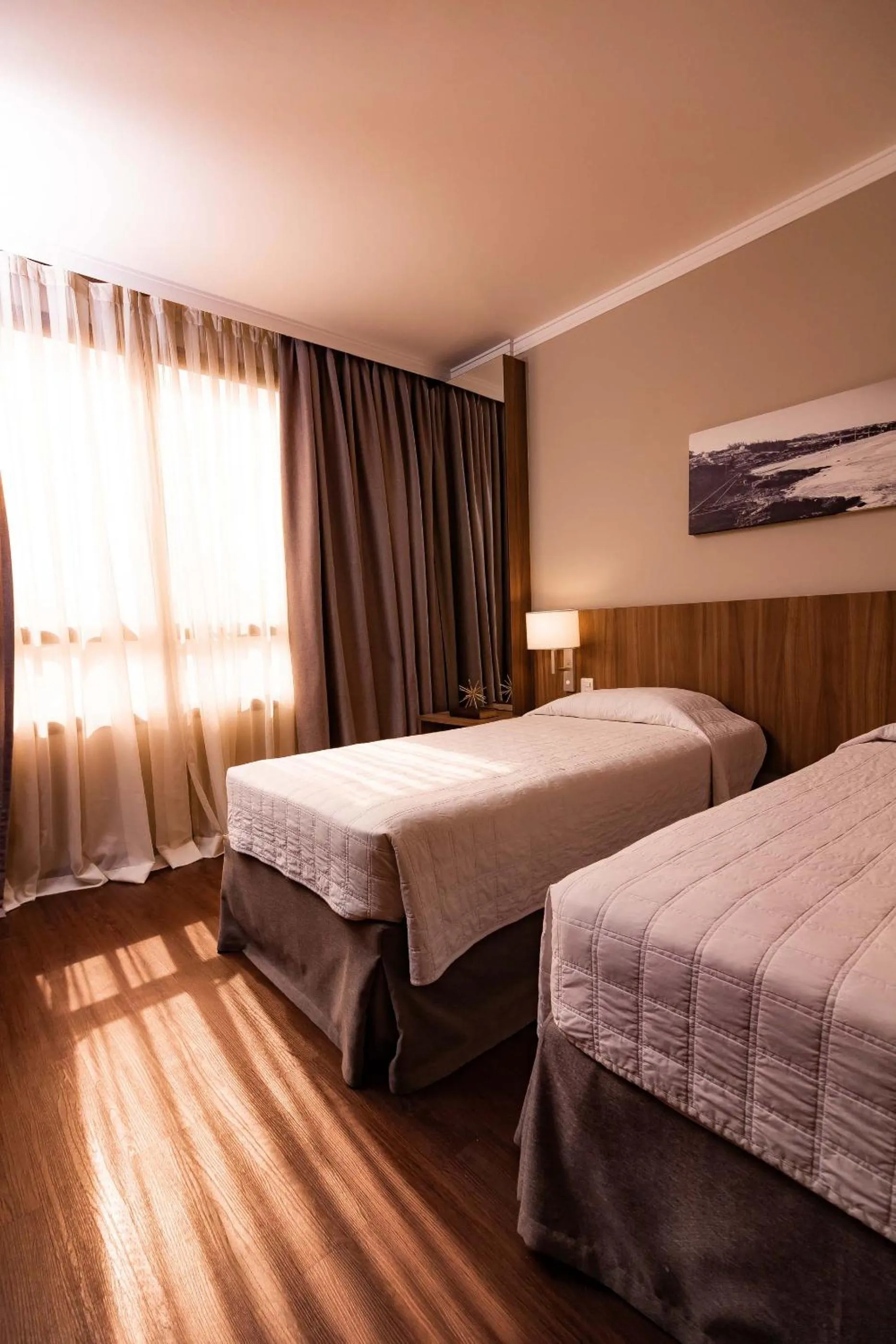 Bed in Kennedy Executive Hotel