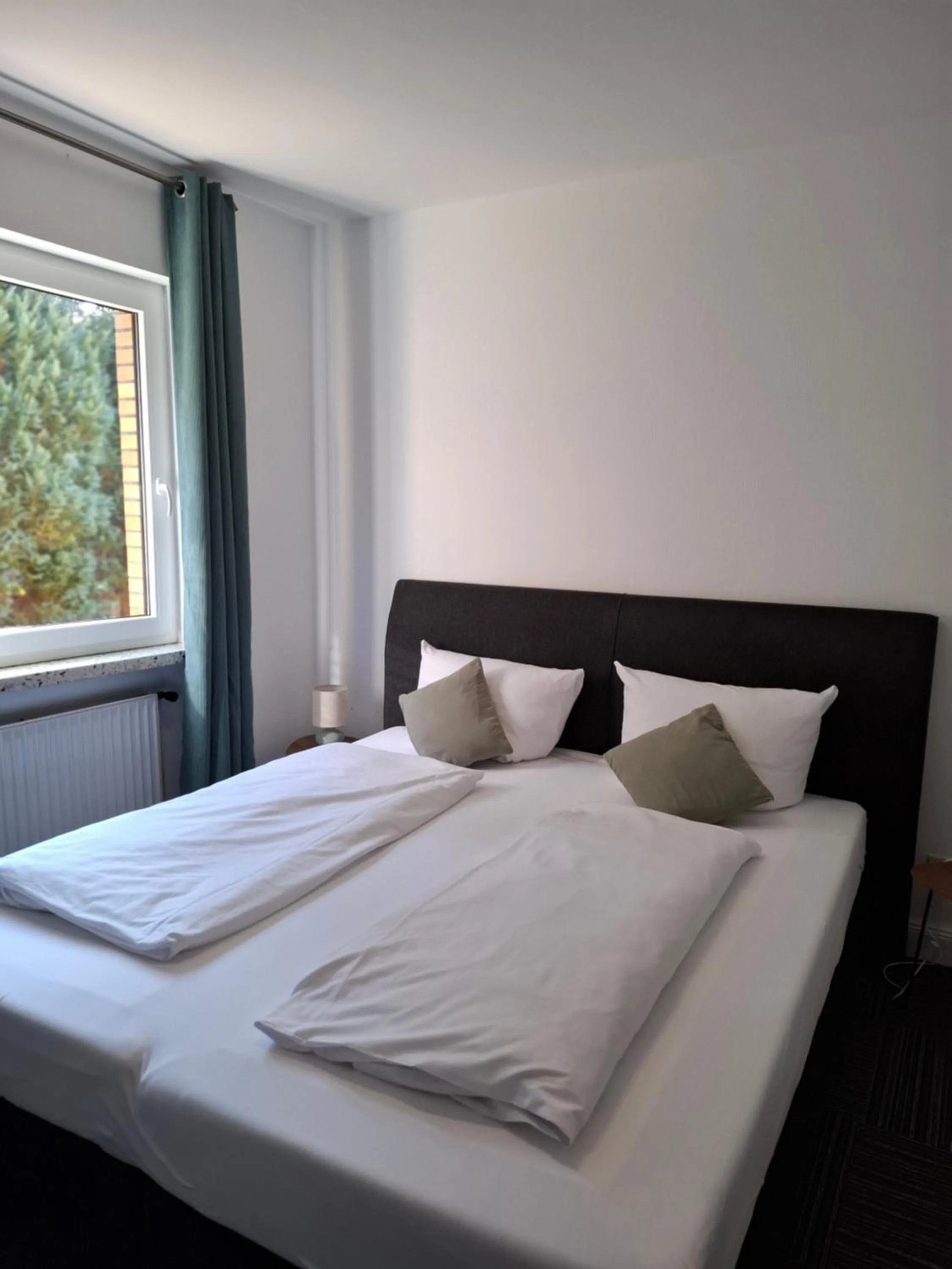 Photo of the whole room, Bed in Hotel Am Schwarzen Berg