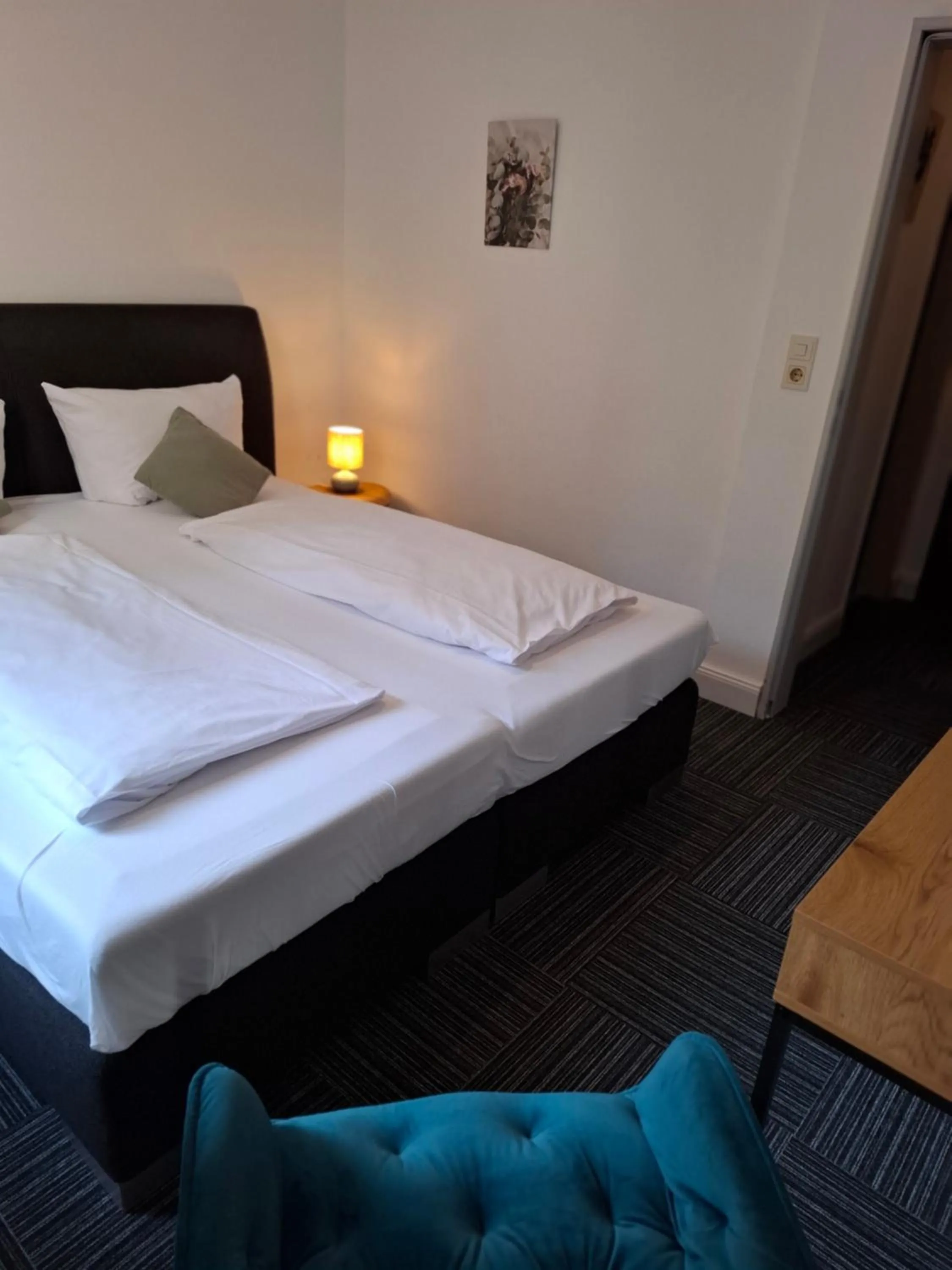 Photo of the whole room, Bed in Hotel Am Schwarzen Berg