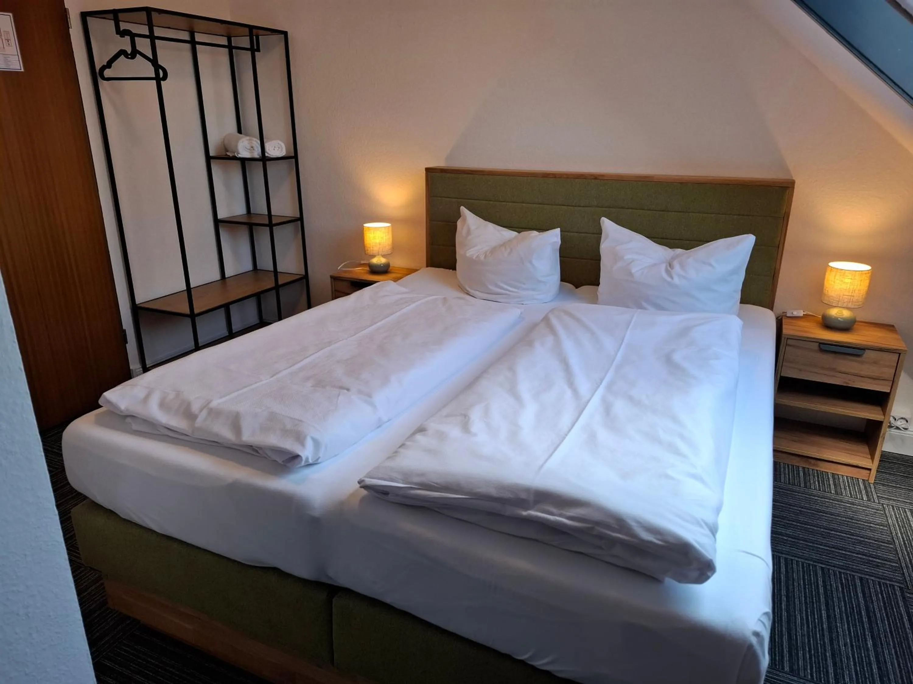 Photo of the whole room, Bed in Hotel Am Schwarzen Berg