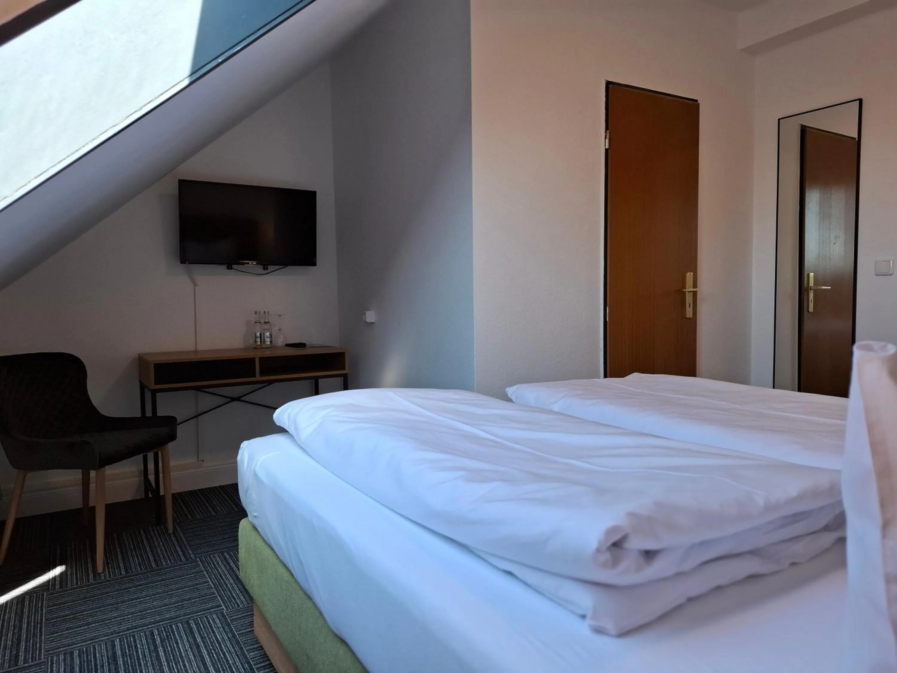 Photo of the whole room, Bed in Hotel Am Schwarzen Berg