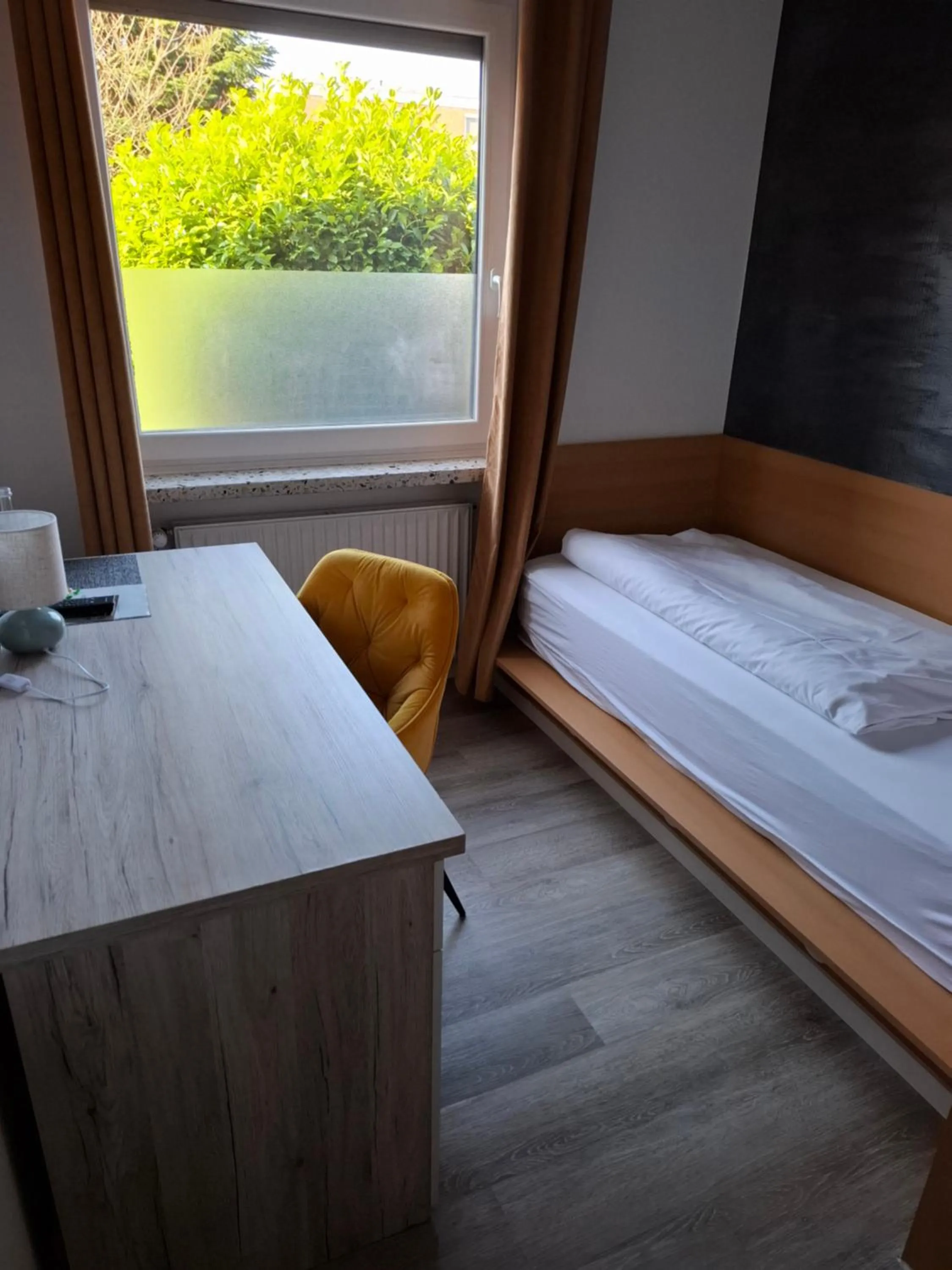 Photo of the whole room, Bed in Hotel Am Schwarzen Berg