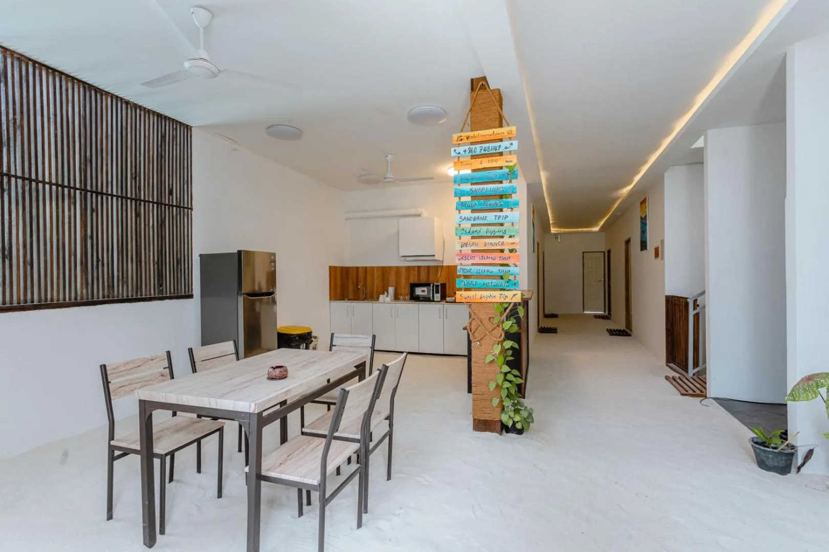 Communal lounge/ TV room in Violet Inn Hotel