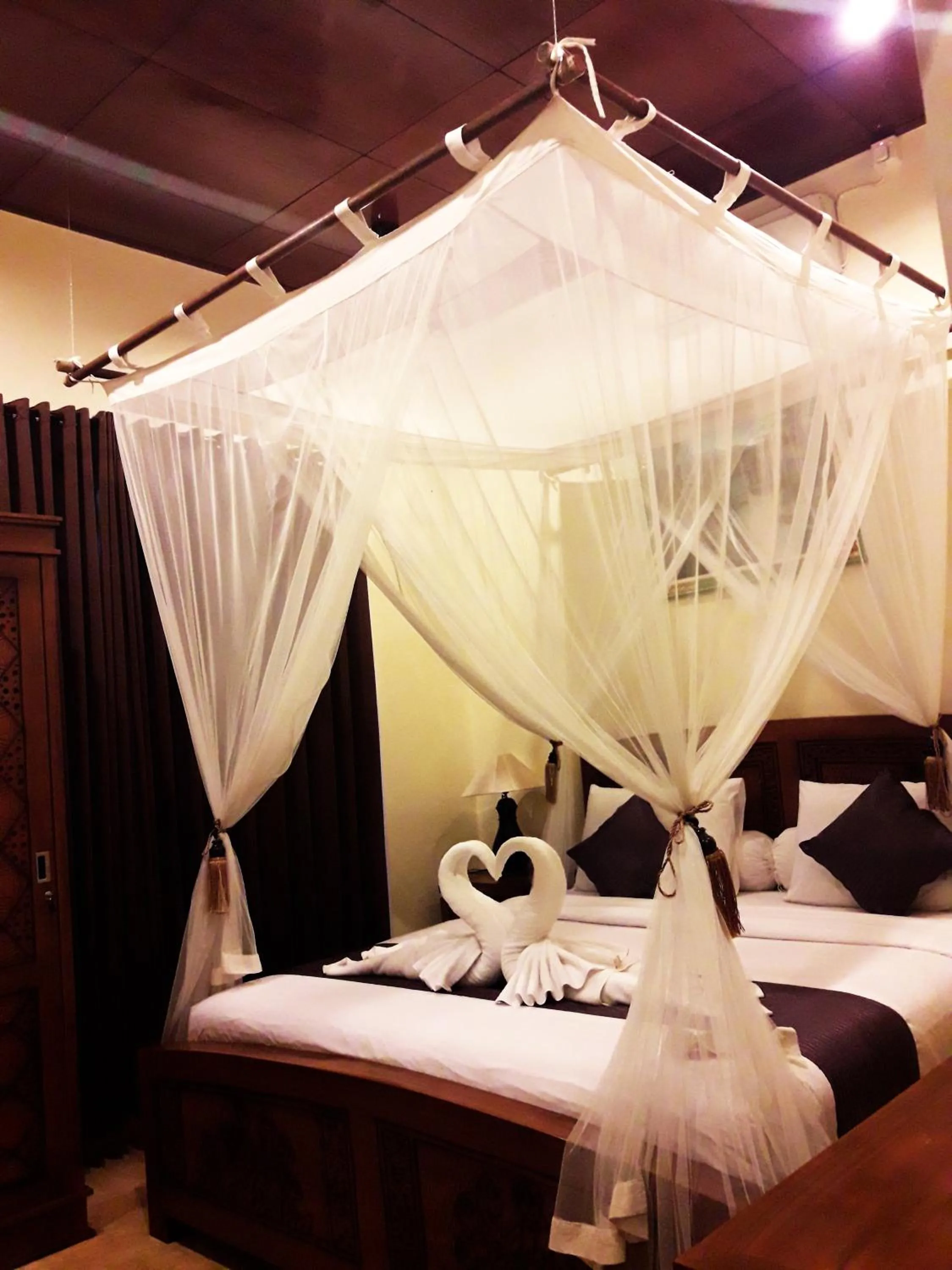 Bed in Royani Villa