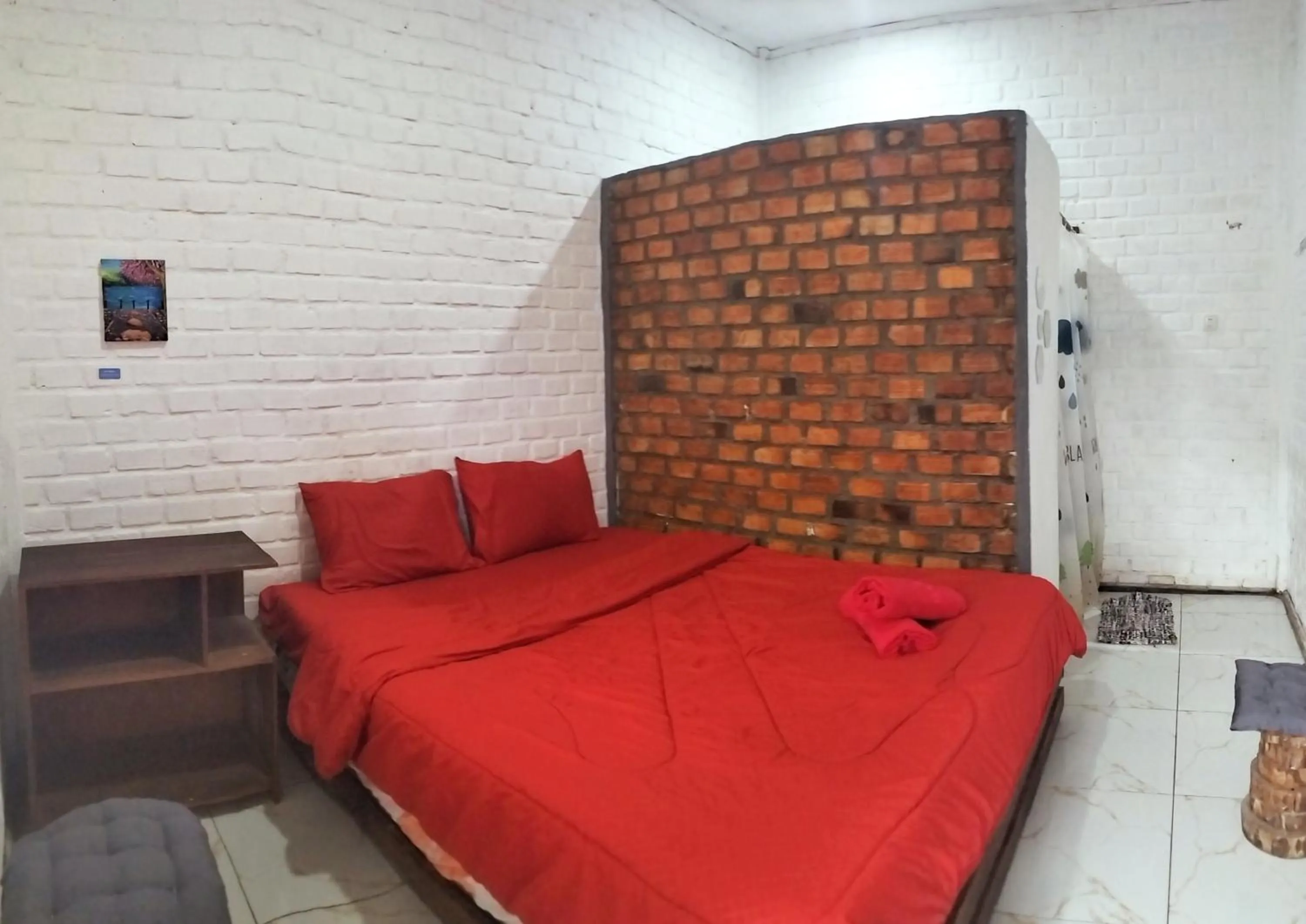 Bed in AZALEA GARDEN HOMESTAY