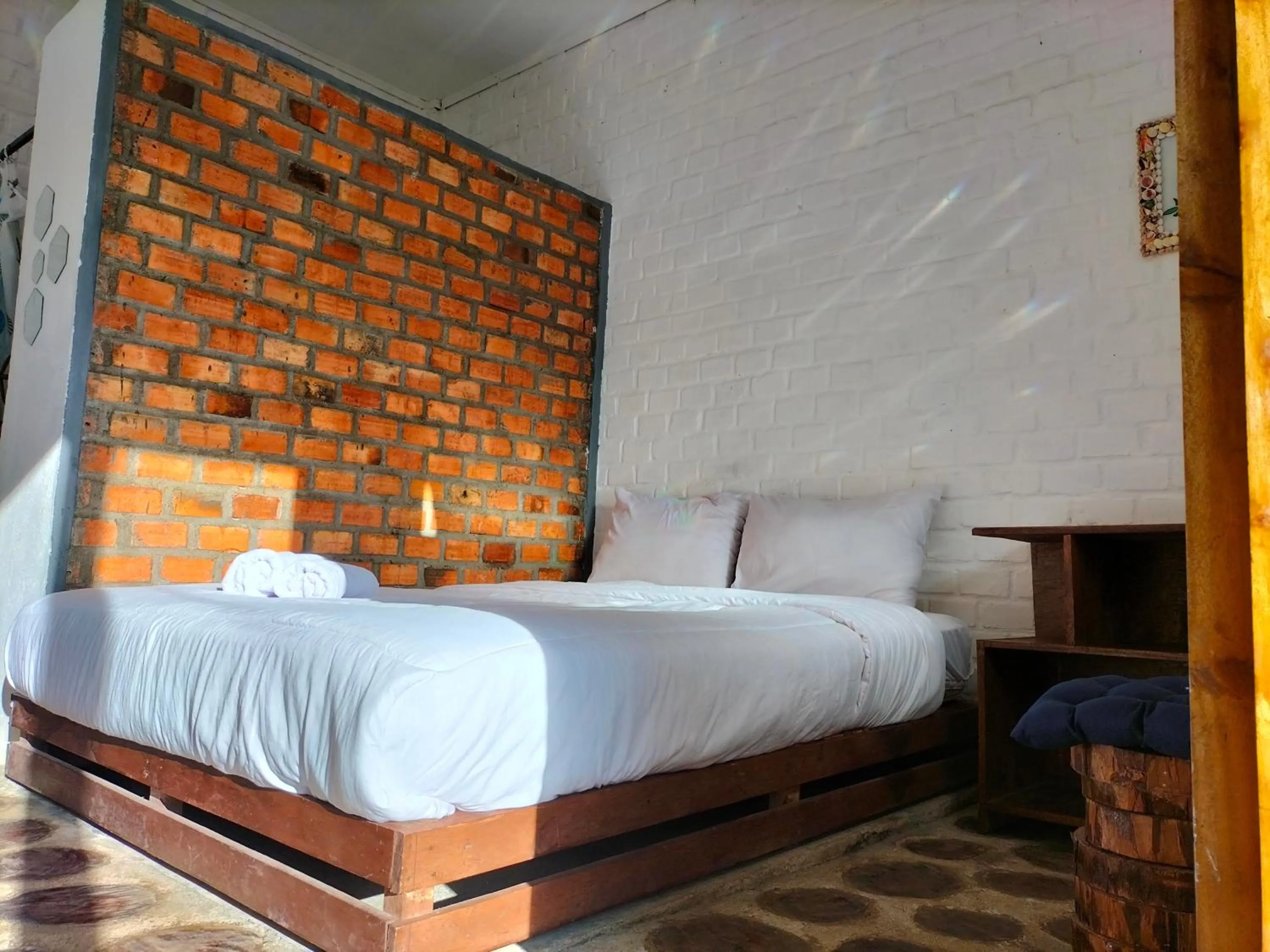 Bed in AZALEA GARDEN HOMESTAY
