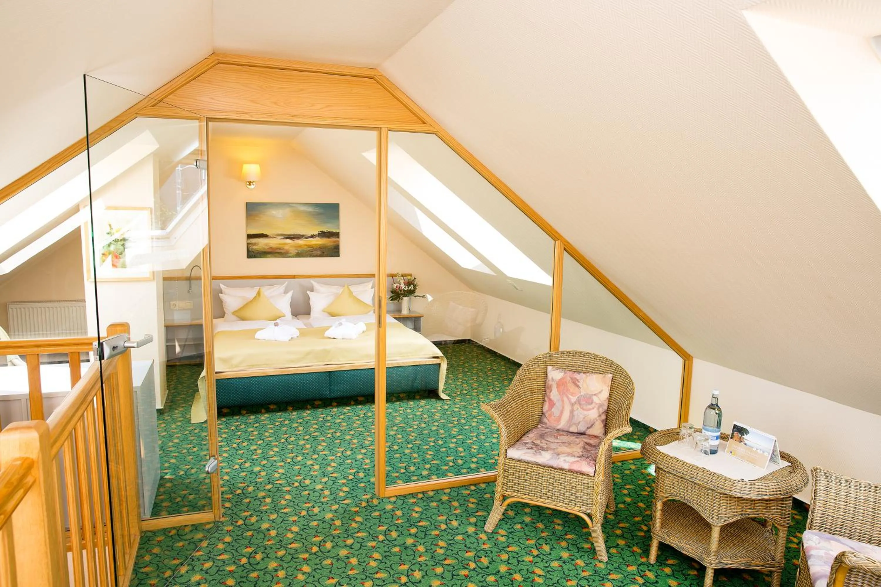Seating area, Bed in Hotel am Müritz-Nationalpark