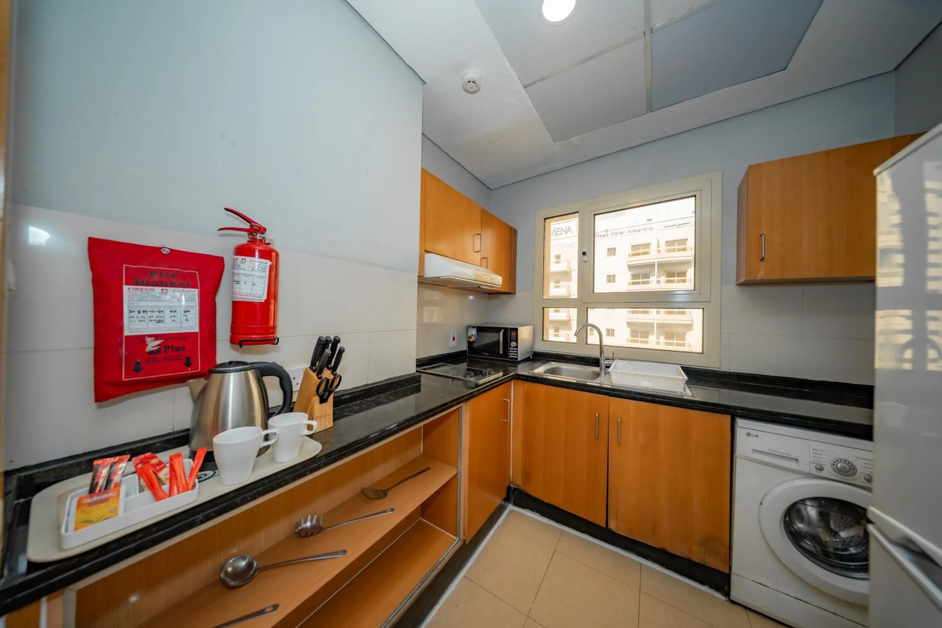 Kitchen or kitchenette in City Stay Grand Hotel Apartments - Al Barsha