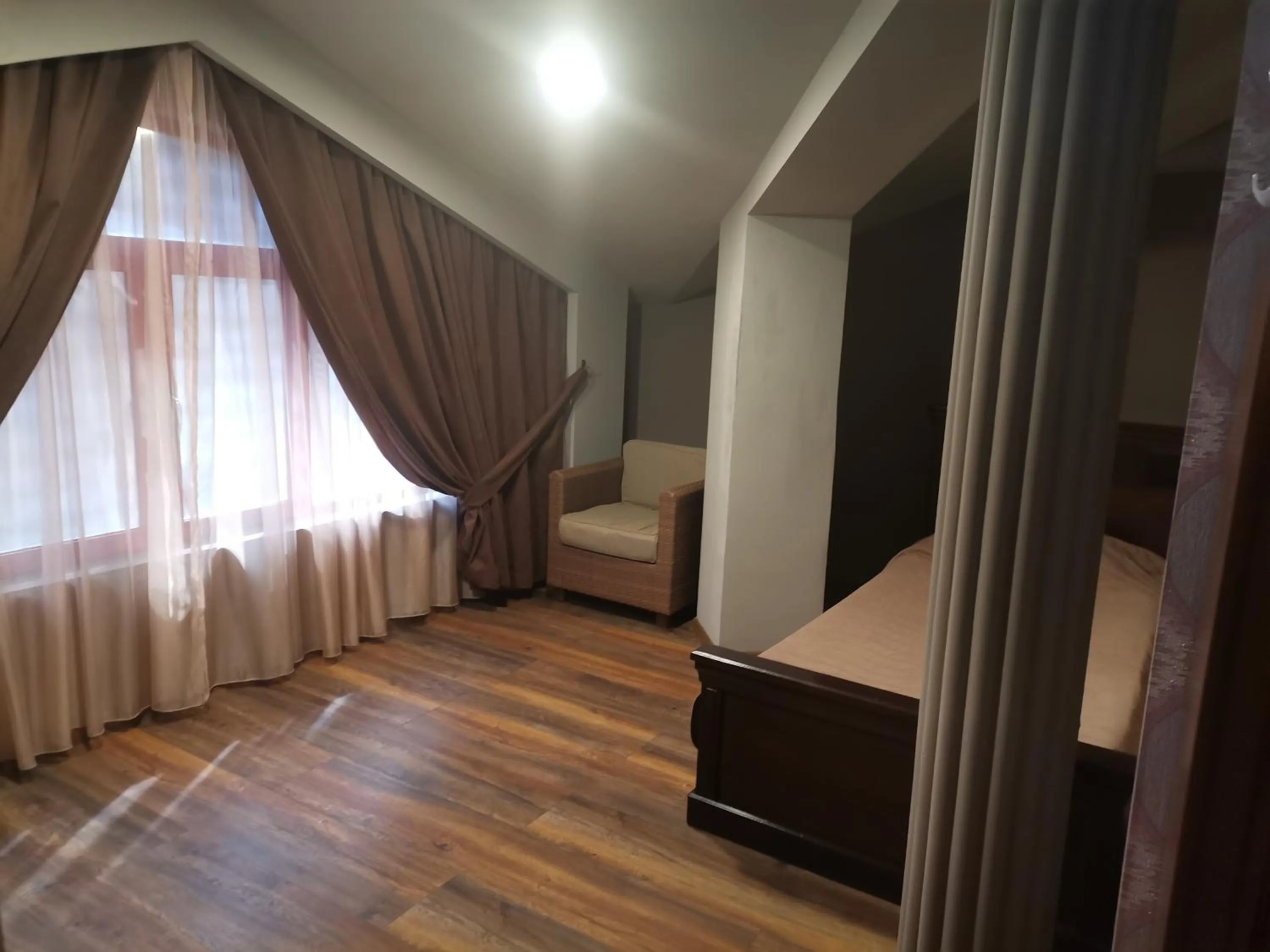 Communal lounge/ TV room, Bed in Vival Hotel