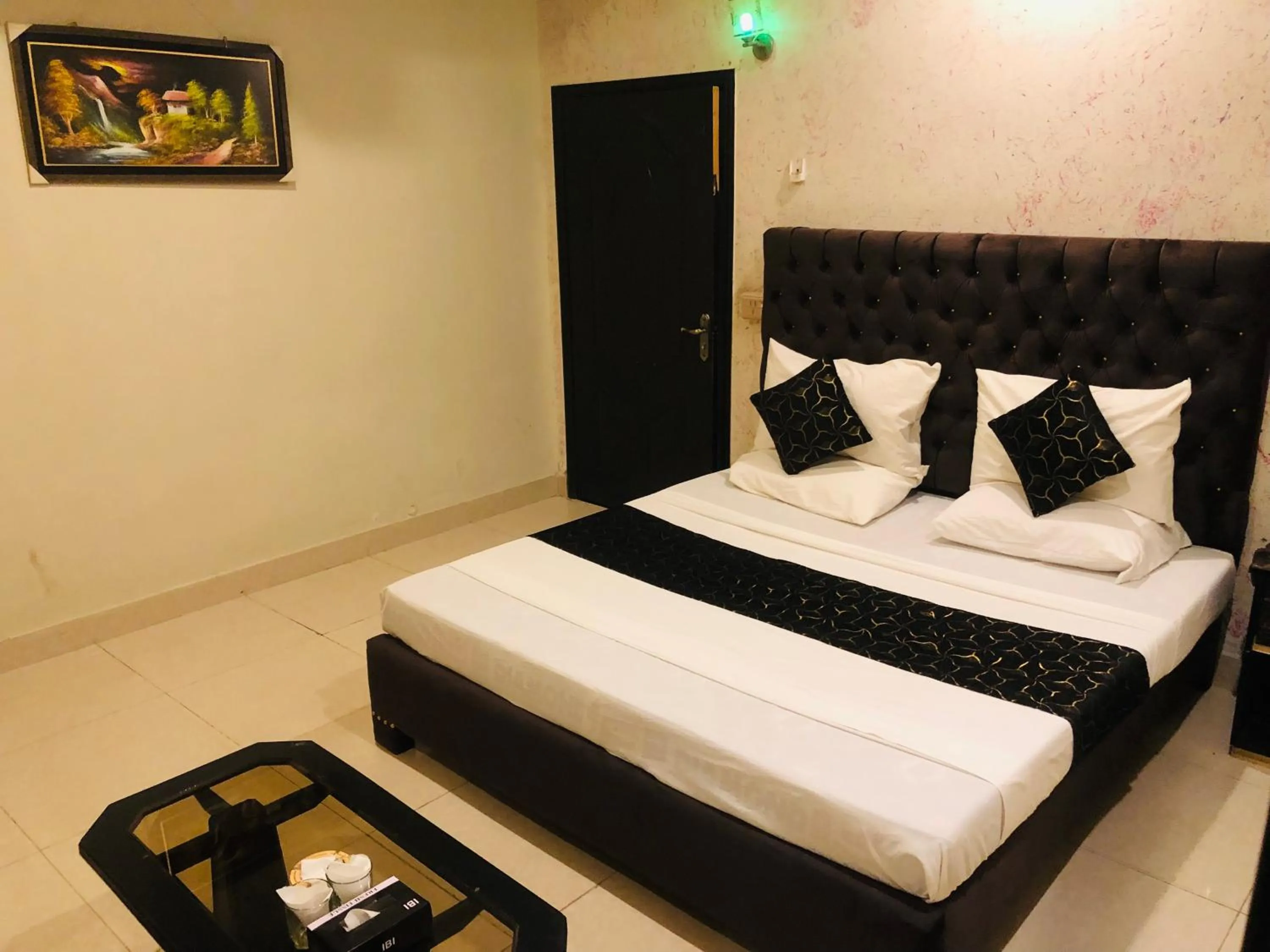 Bed in Hotel Tulip Inn