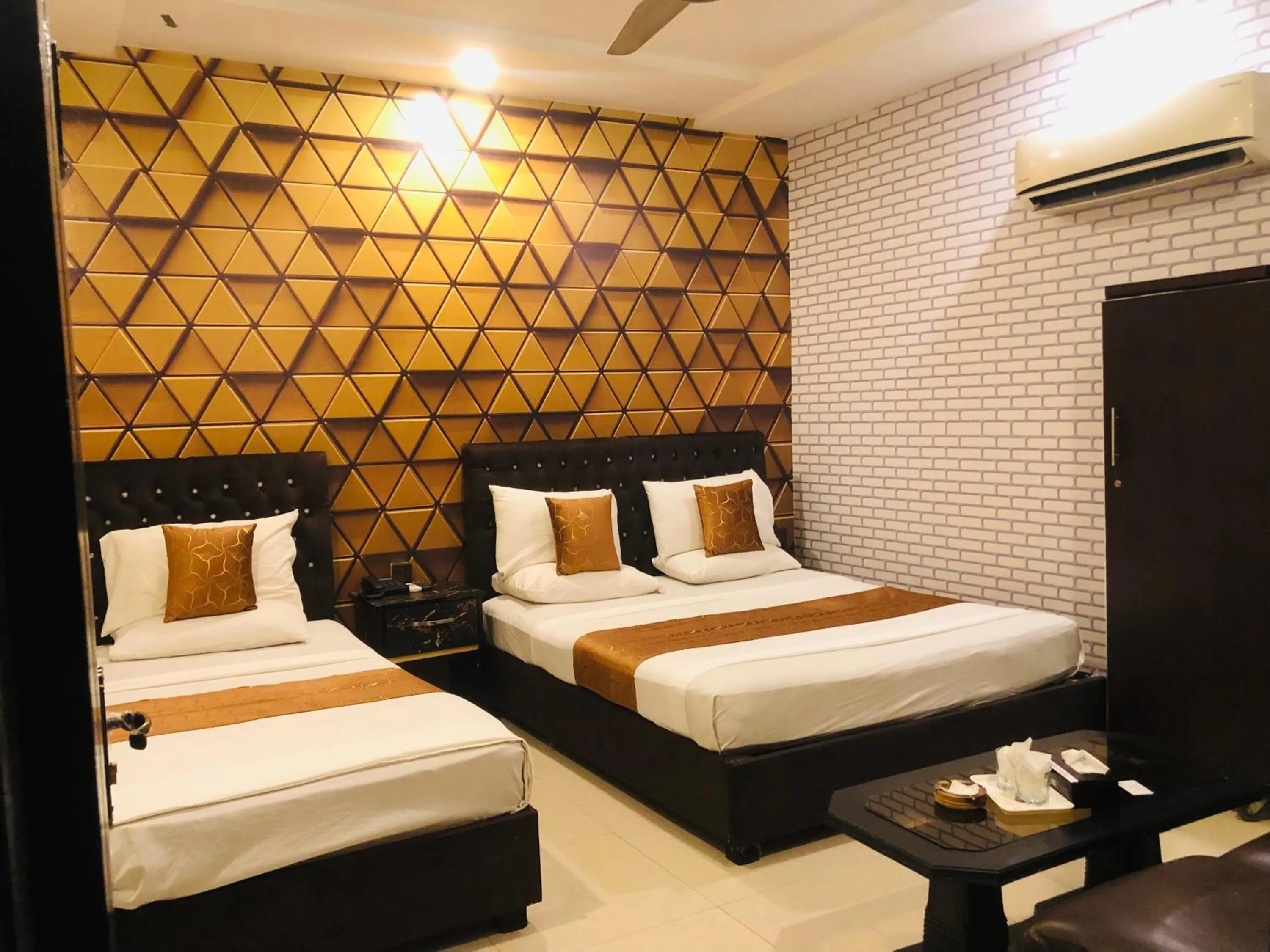 Bed in Hotel Tulip Inn