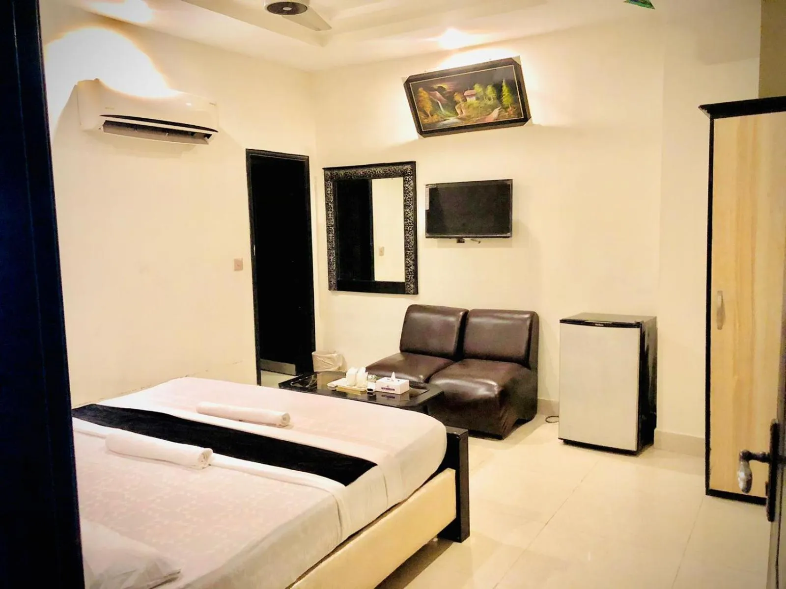 Bed in Hotel Tulip Inn