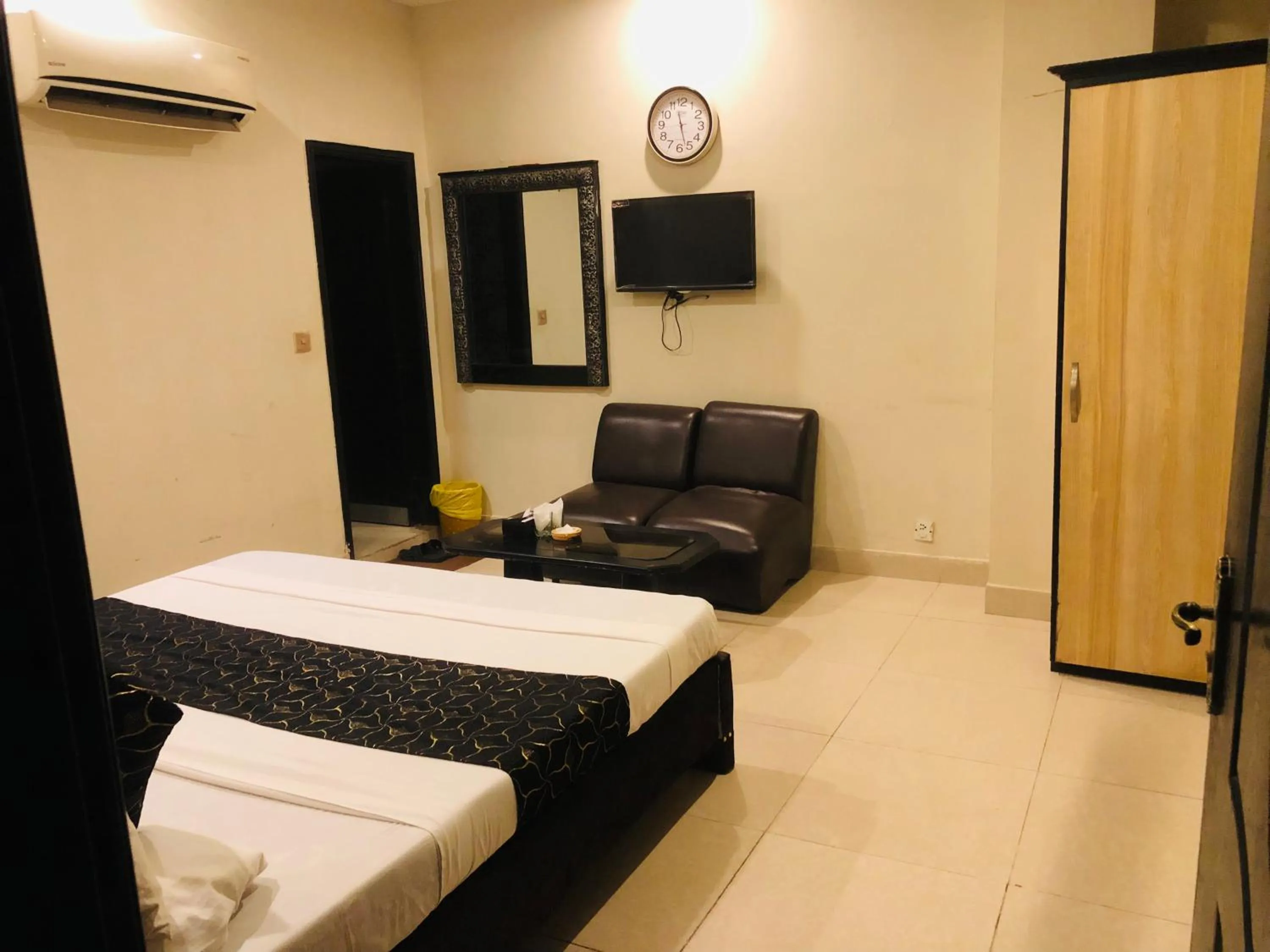 Bed in Hotel Tulip Inn