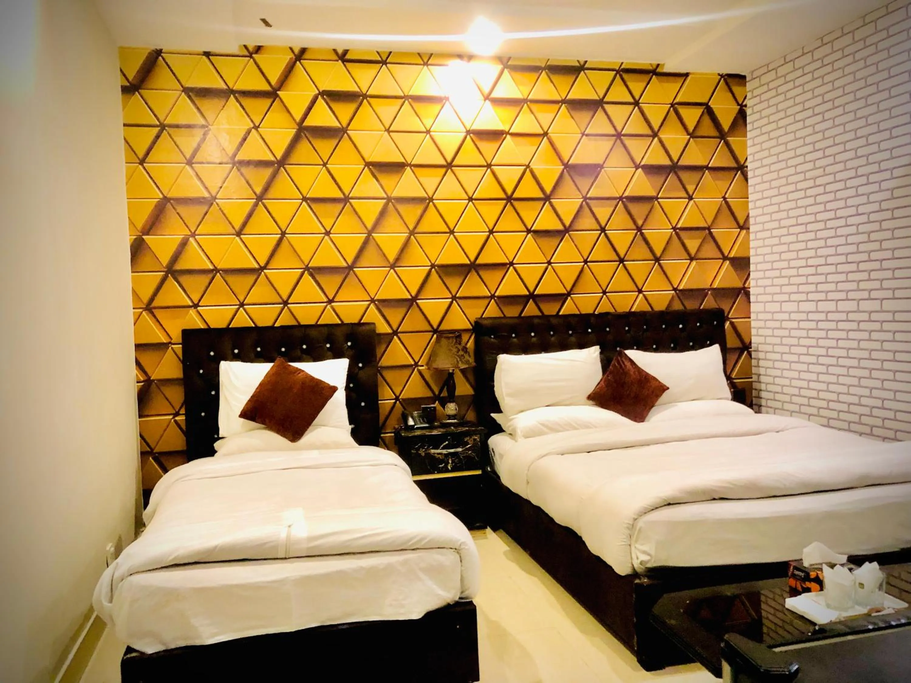 Bed in Hotel Tulip Inn