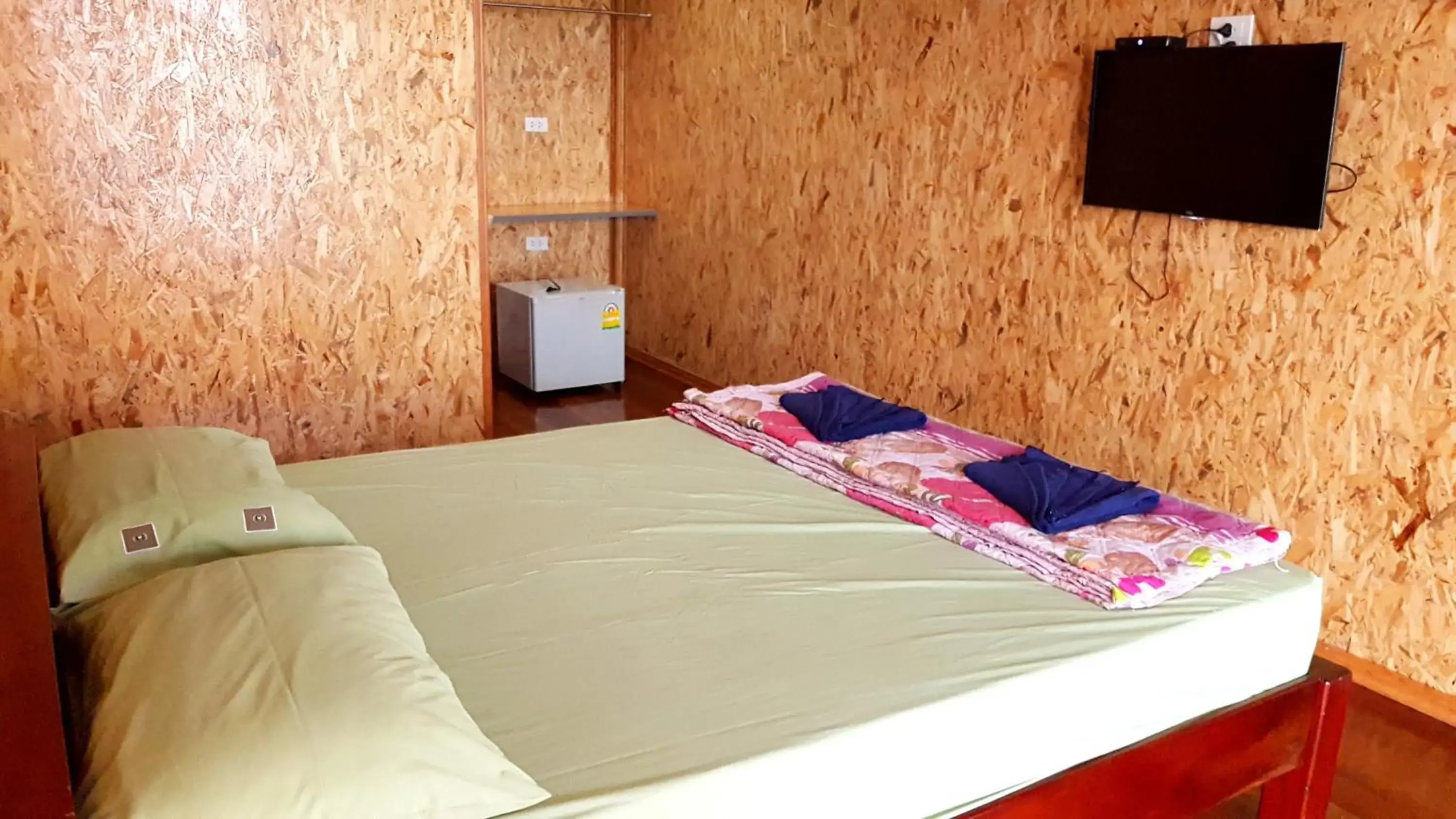 Bed in Tamarind Guesthouse Bed in Tamarind Guesthouse