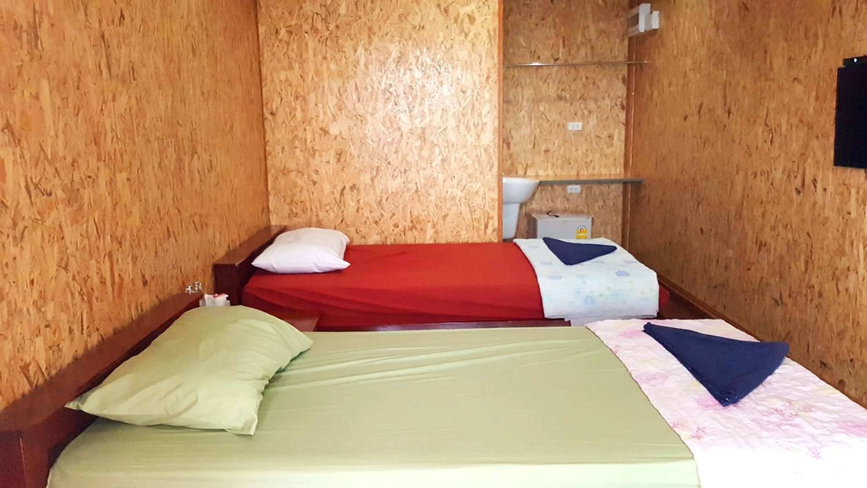 Bed in Tamarind Guesthouse