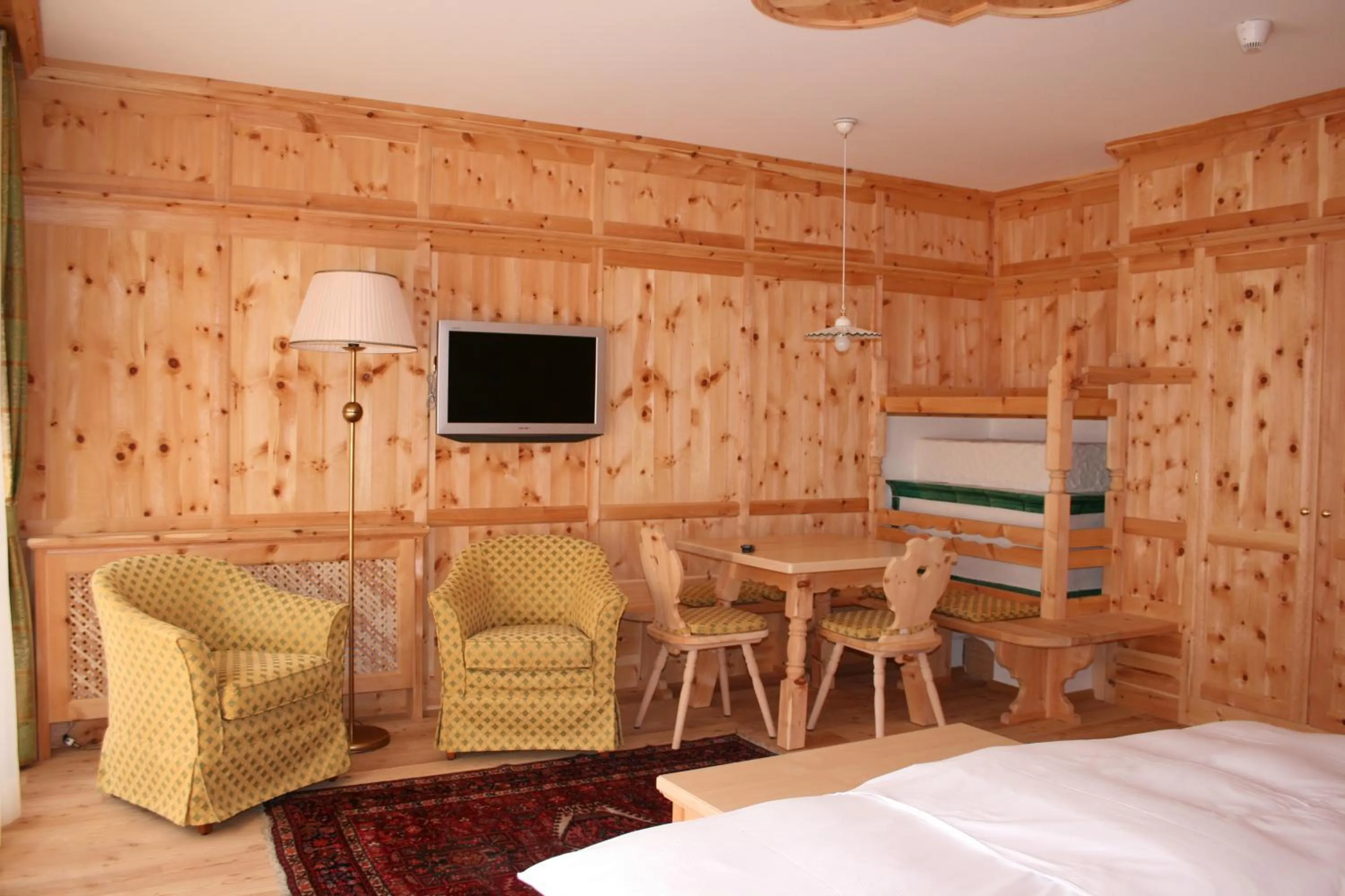 Seating area, Bed in Hotel Lorenzetti