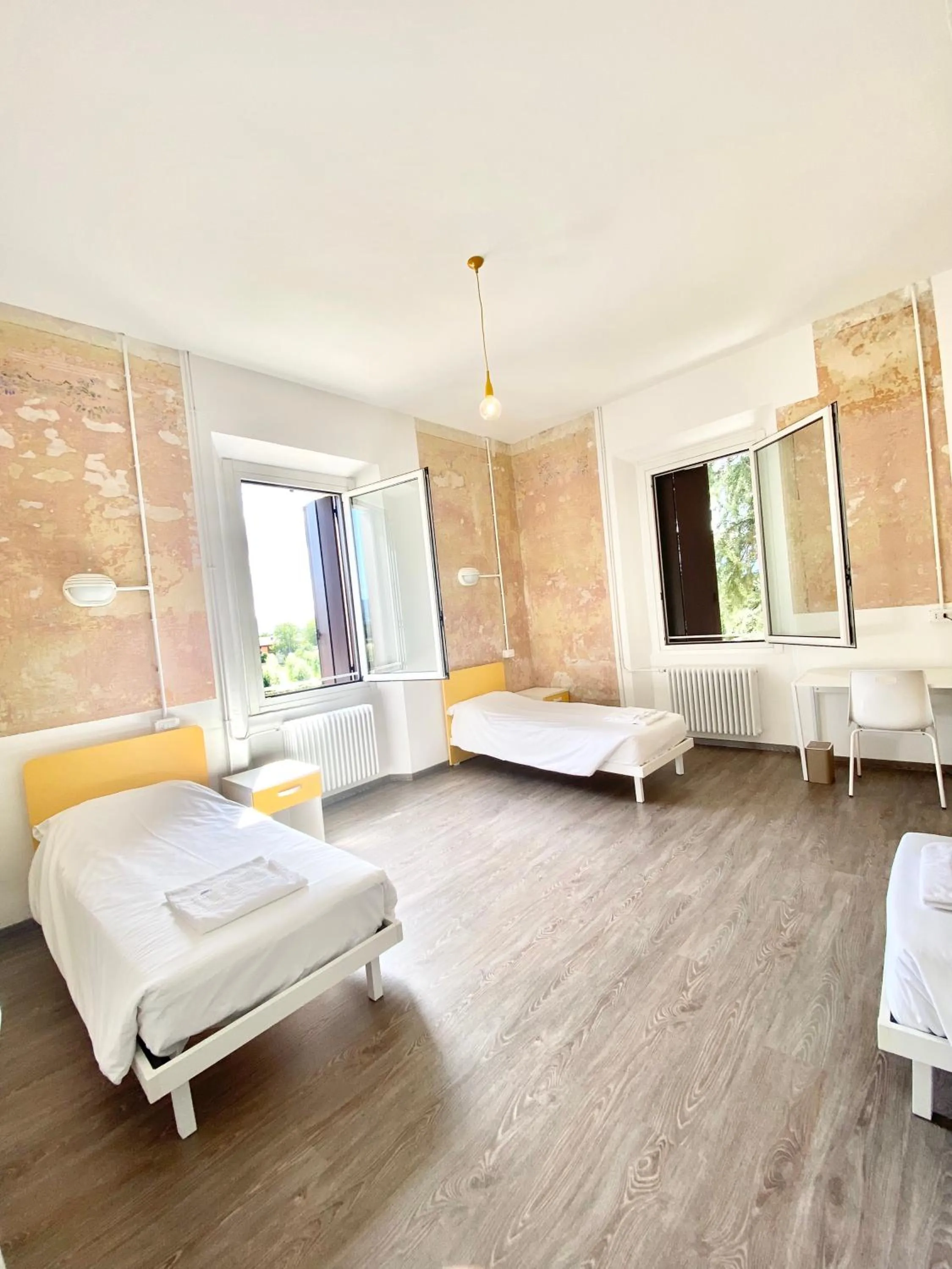 Photo of the whole room, Bed in BRIBANO HOSTEL & bike sharing-workers and tourists hospitality