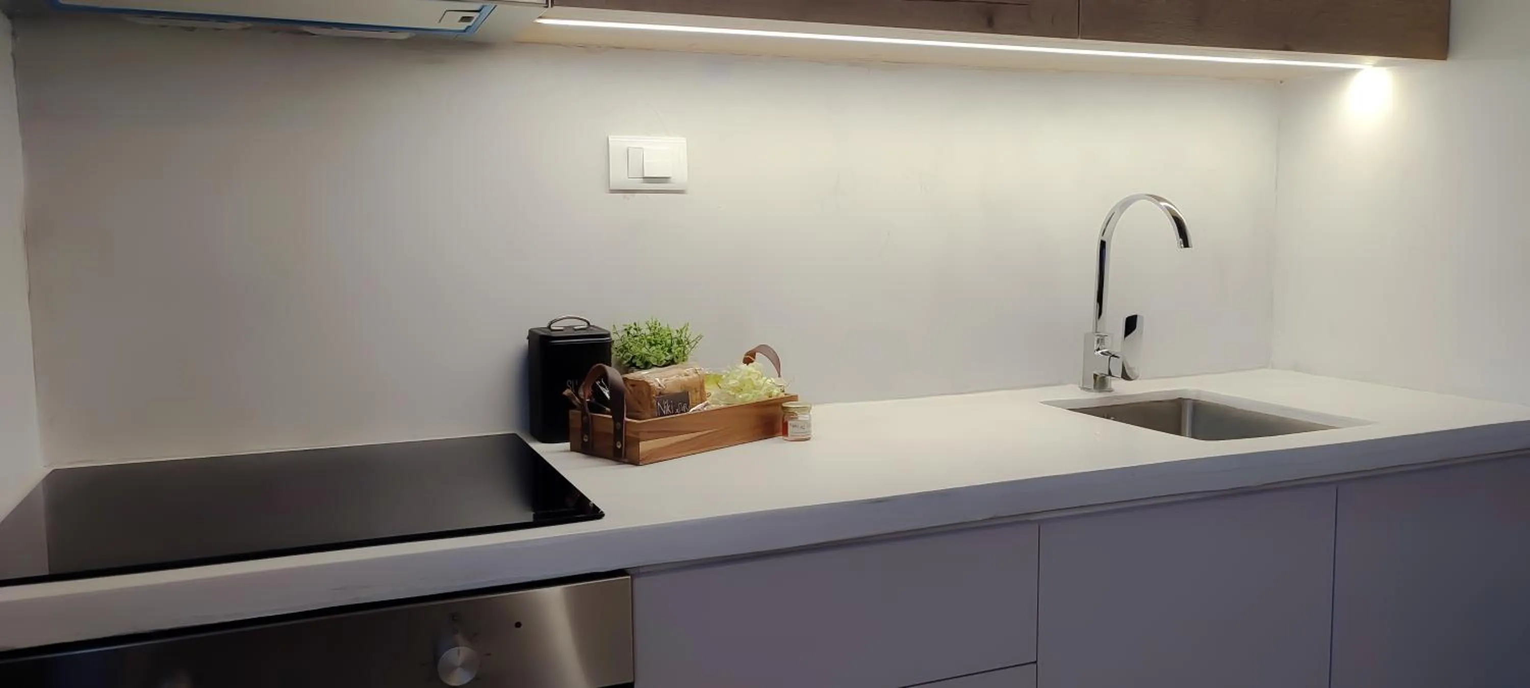 Kitchen or kitchenette in Niki Apartments