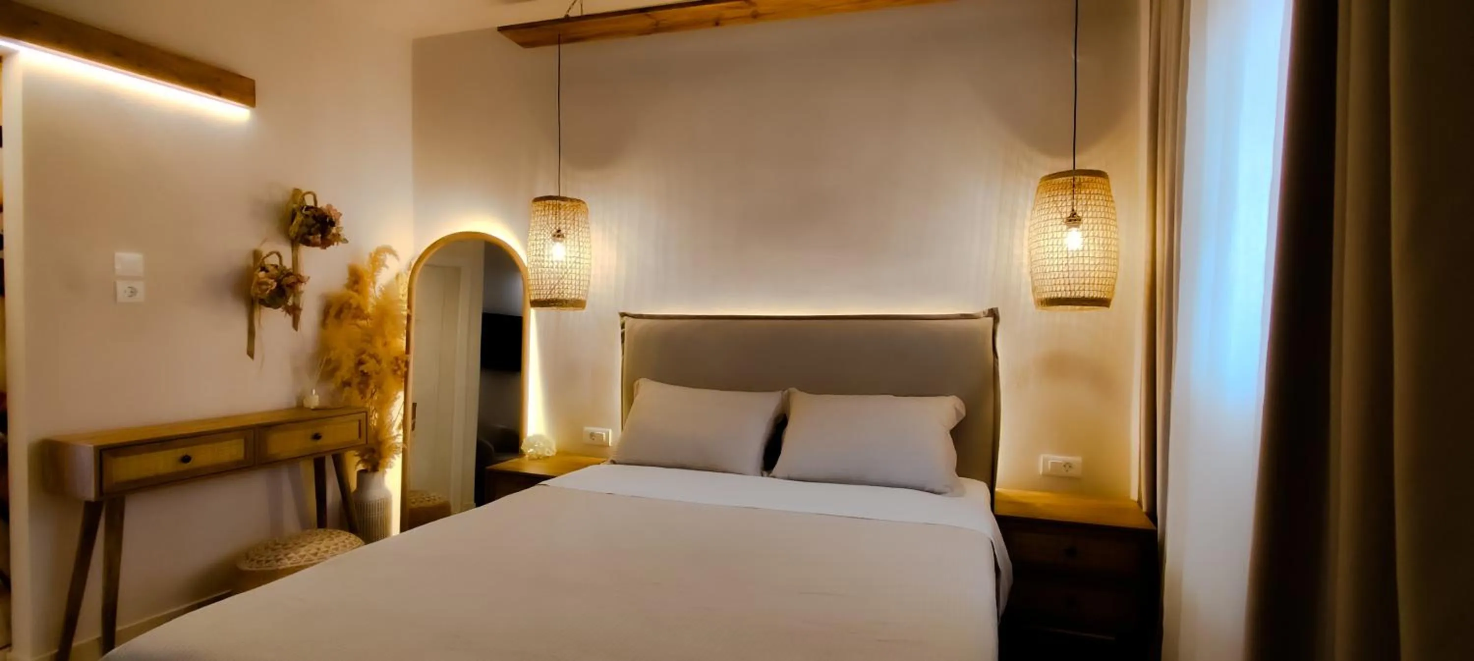 Bed in Niki Apartments