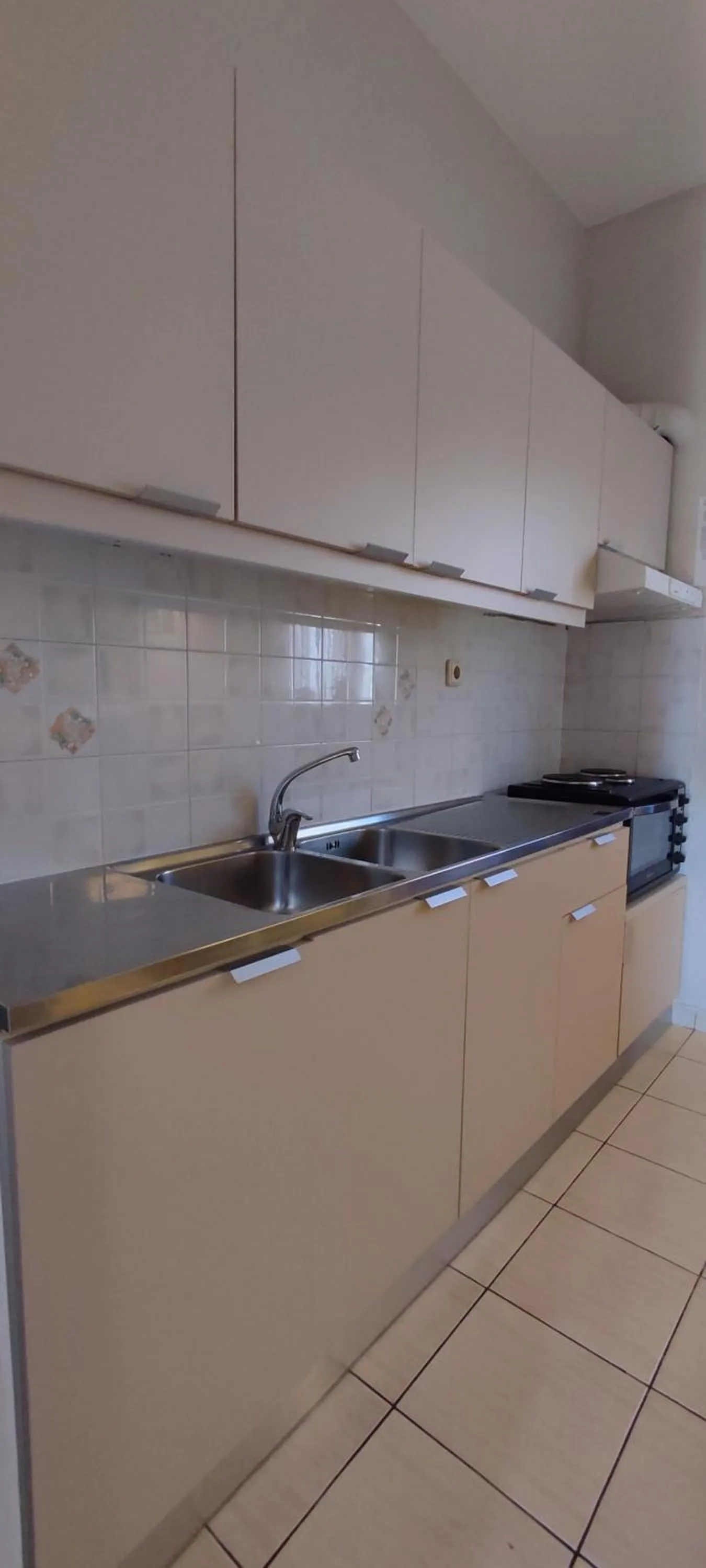 Kitchen or kitchenette in Niki Apartments