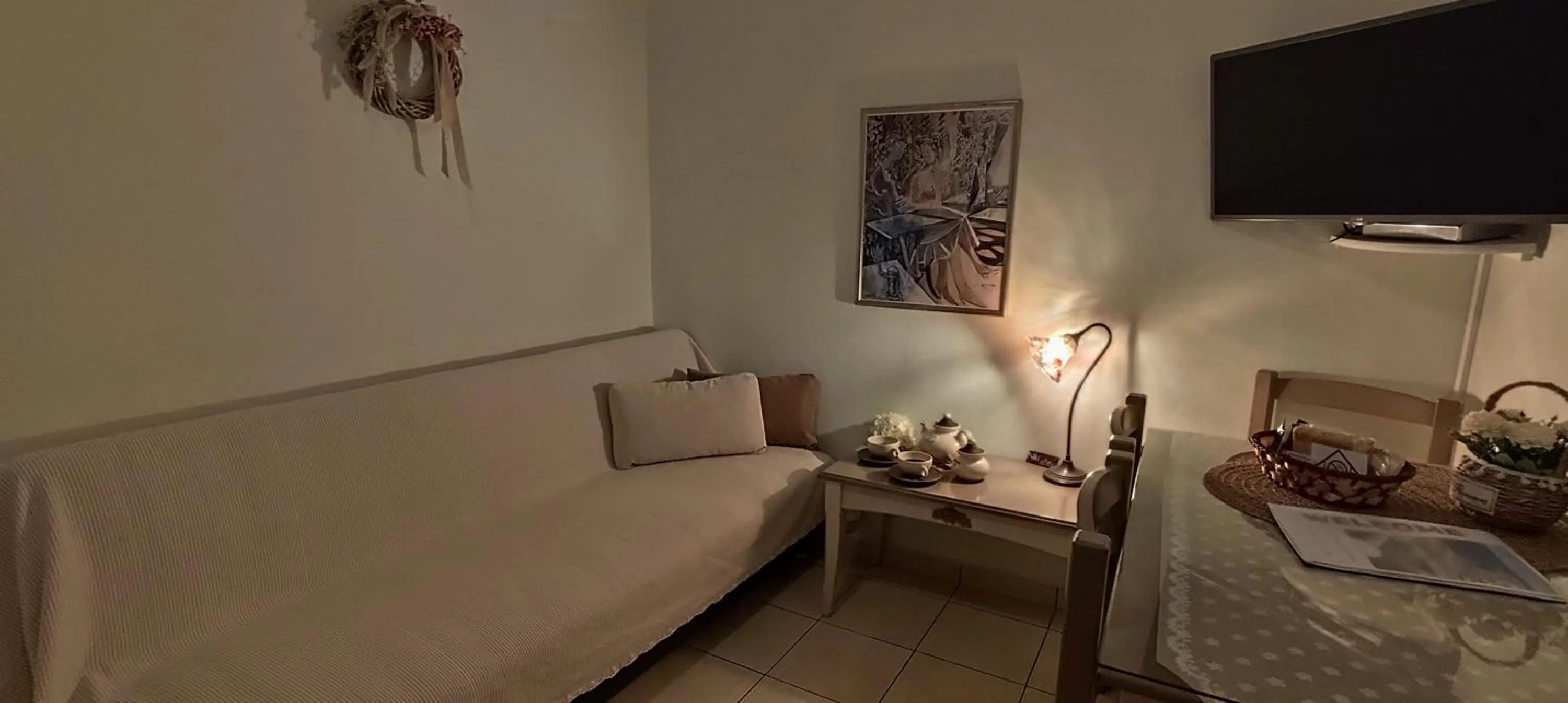 Living room, Bed in Niki Apartments