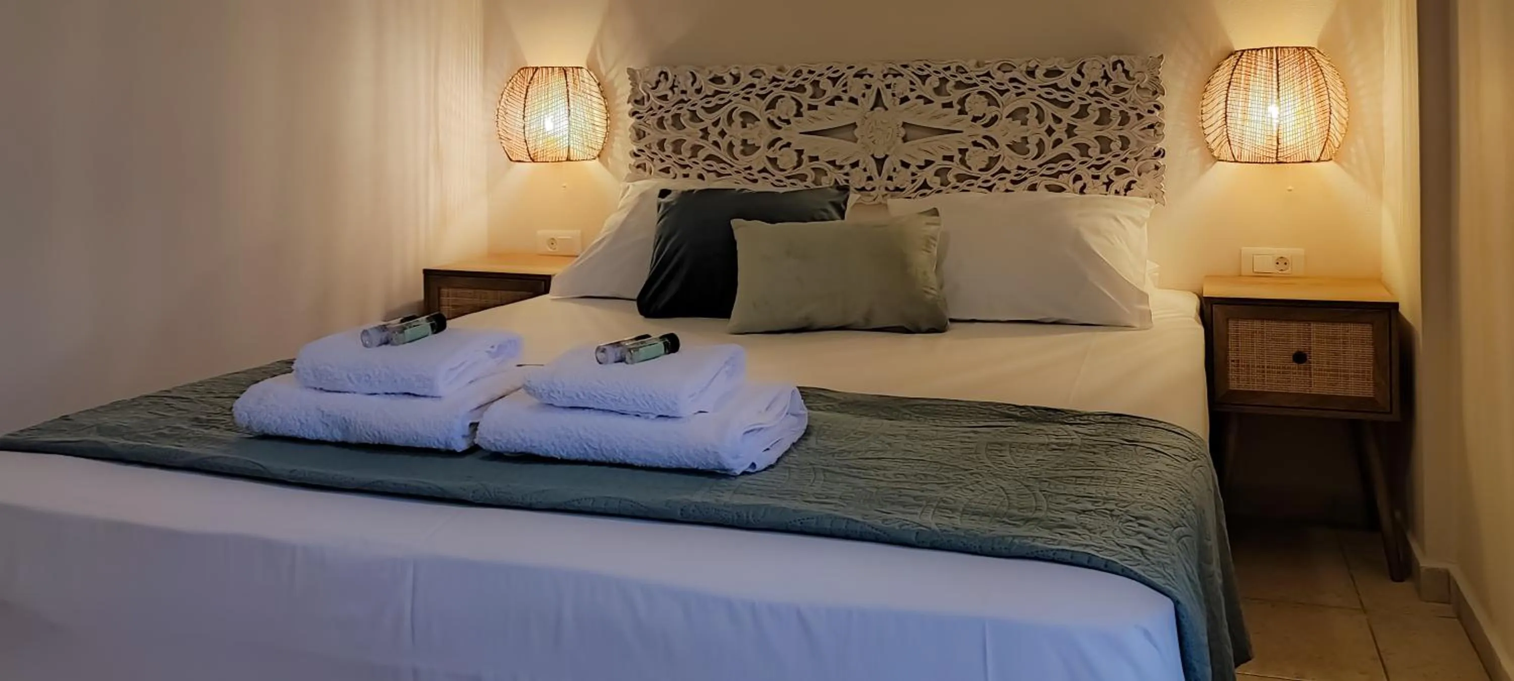 Bed in Niki Apartments