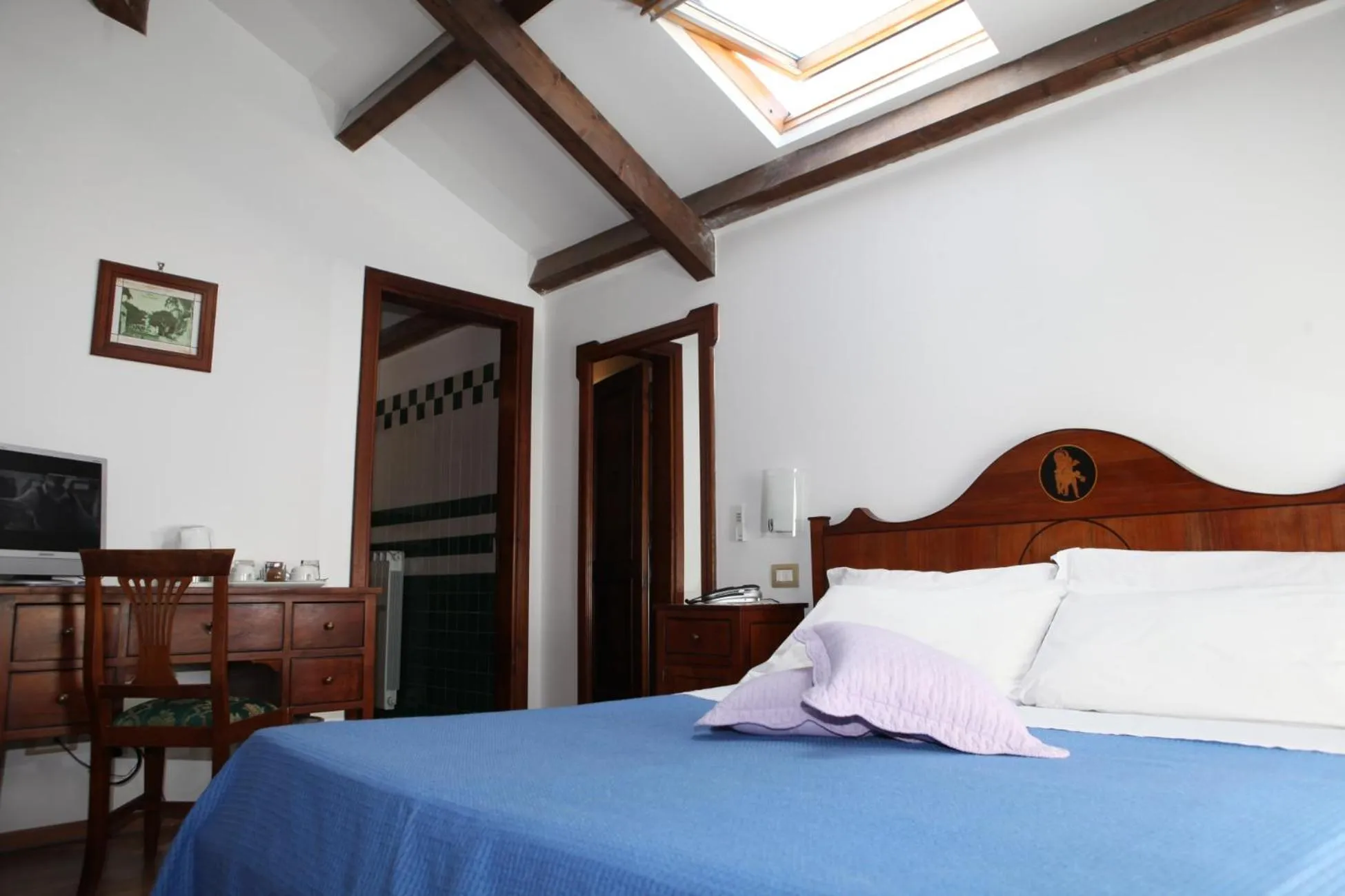 Bed in La Magnolia Sorrento - City Centre Hotel