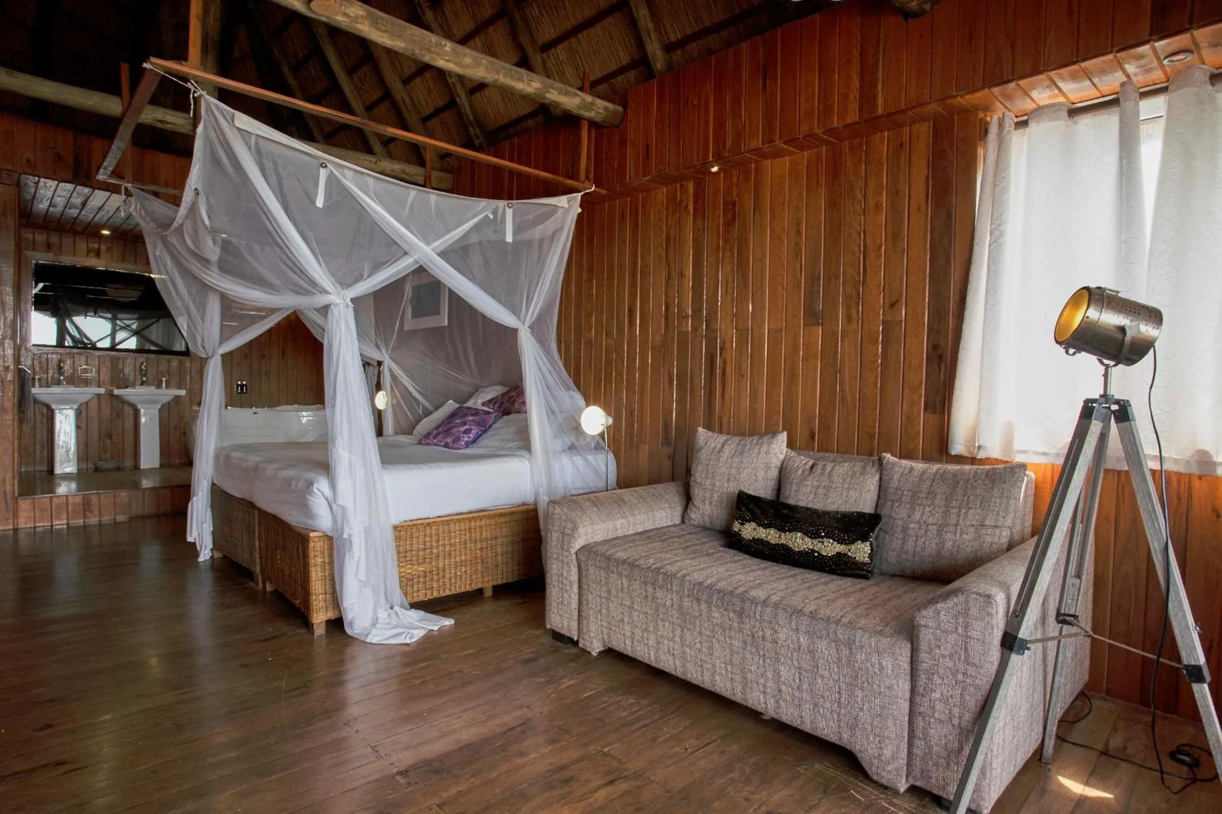 Bed in Catembe Gallery Hotel